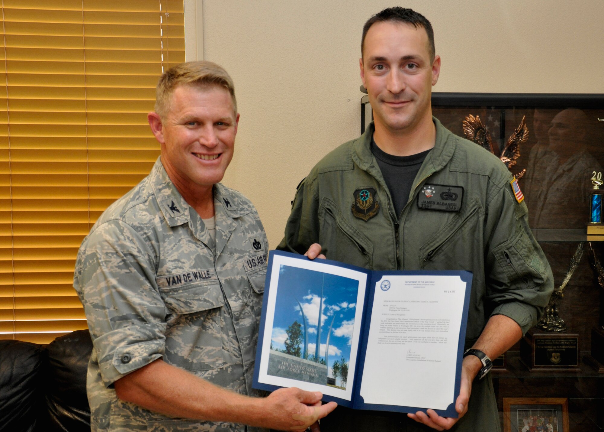 Tech. Sgt. James Albanesi, 1st Special Operations Logistics Readiness Squadron, Forward Aerial Refueling Point program manager, received the Air Force Fuels NCO of the Year award for 2010 from Col. Curt Van De Walle, 1st Special Operations Mission Support Group commander, at Hurlburt Field, Fla., June 22, 2011. Sergeant Albanesi managed the only FARP training school in the Air Force, teaching 12 classes and helping the combat posture of five different MAJCOMs. 