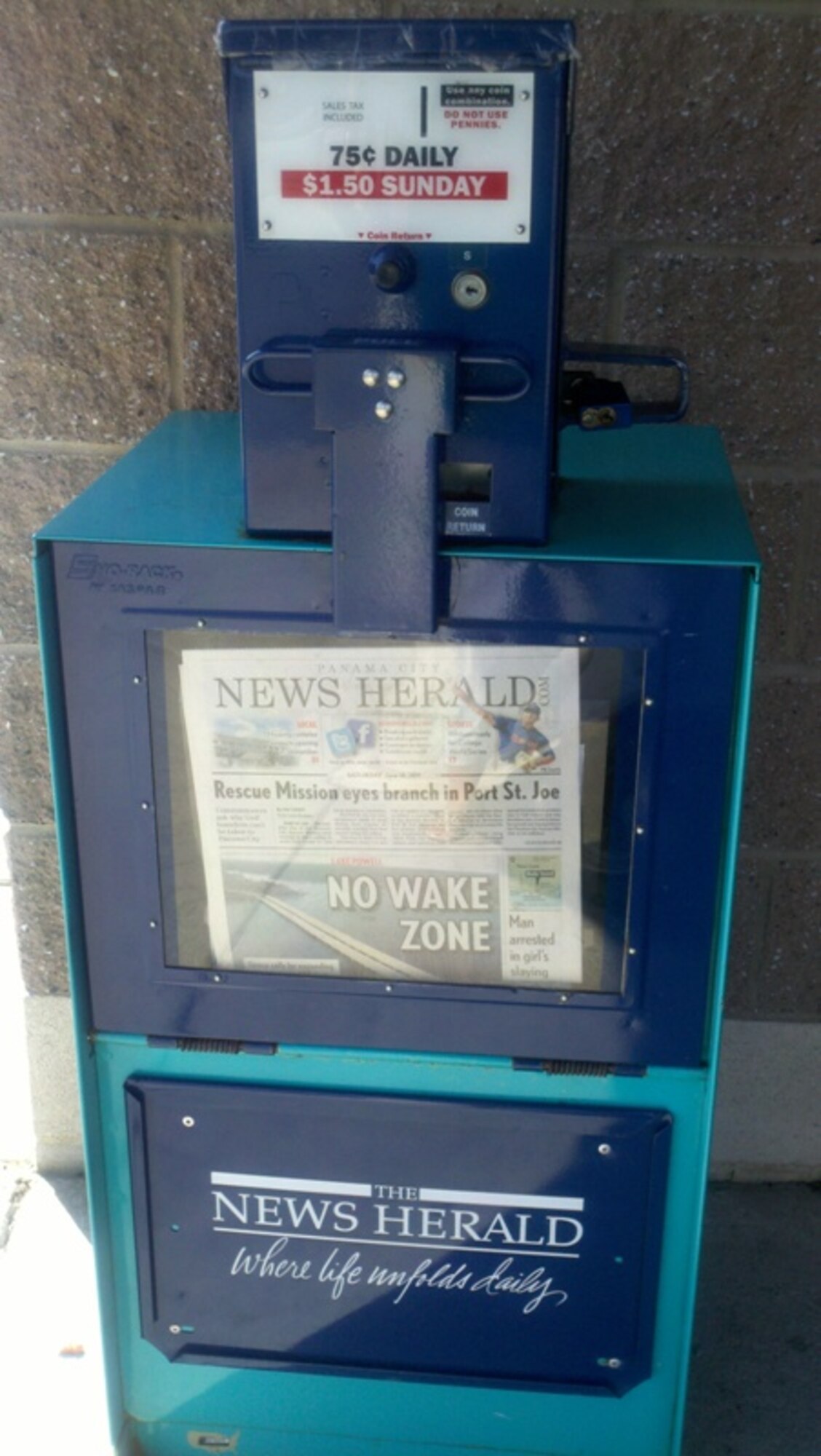 Felix Lake Shoppette newspaper stand.