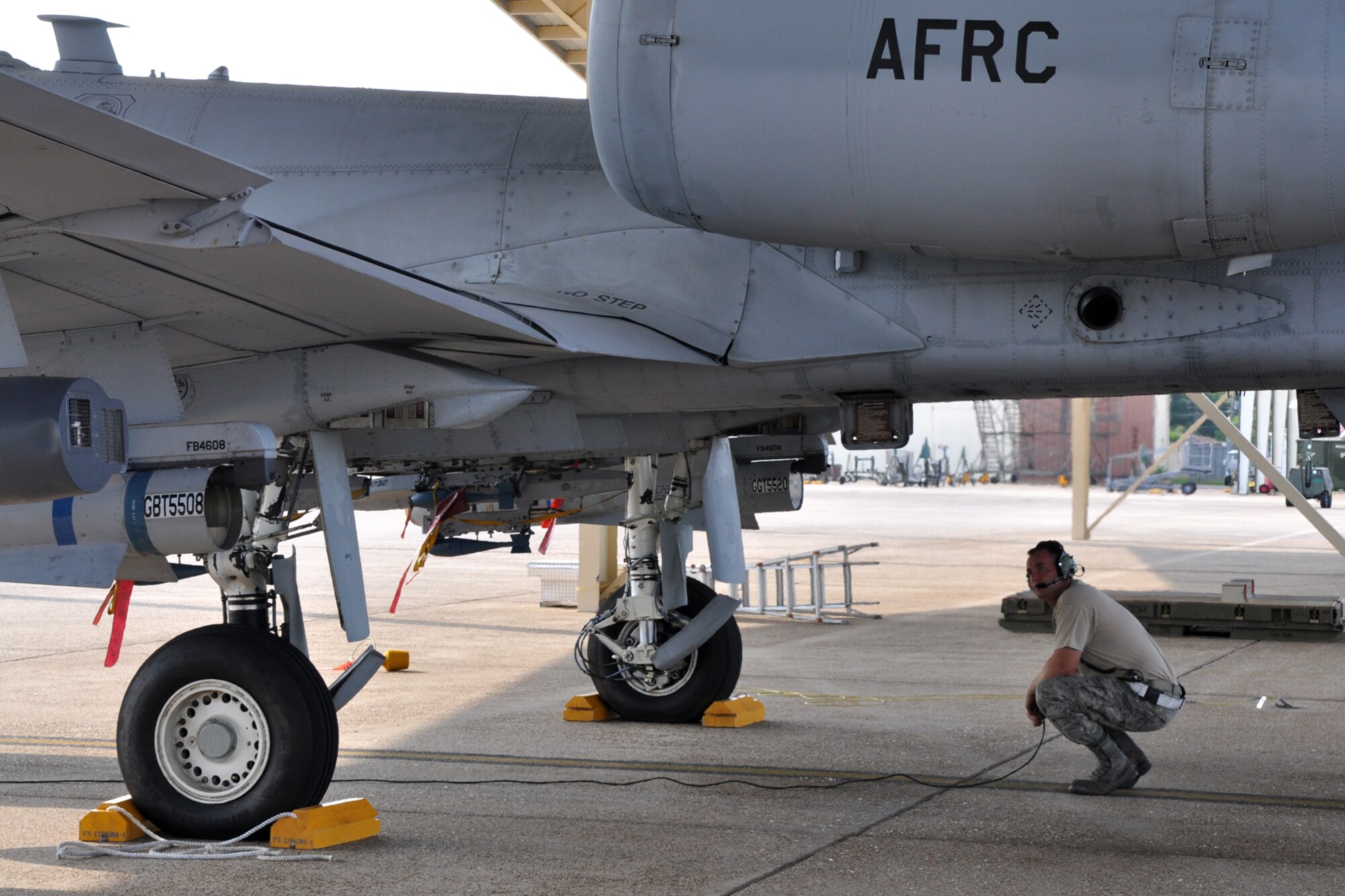 Senior Airman Michael Dutson, 917th Aircraft Maintenance Squadron, performs a visual flight controls check of a 47th Fighter Squadron A-10 Thunderbolt II aircraft prior to a sortie, at Barksdale Air Force Base, La., June 15, 2011. The sortie was to Claiborne Bombing and Gunnery Range near Alexandria, La., where BDU-33 practice bombs were dropped on targets. (U.S. Air Force photo/Tech. Sgt. Jeff Walston)