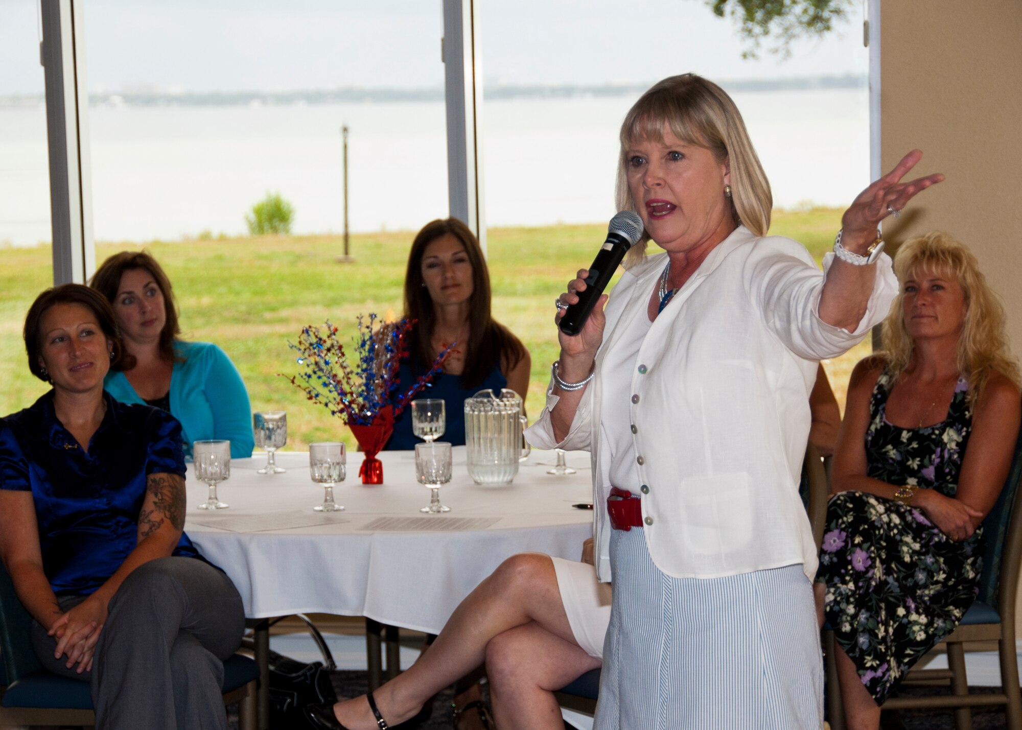 Suzie Schwartz, wife of Air Force Chief of Staff Gen. Norton Schwartz, speaks to approximately 50 key and deployed spouses at the Eglin Club at Eglin Air Force Base, Fla., June 23, 2011.  She shared her experiences as a military spouse dealing with deployments and changes of station, and also collected feedback on successes and challenges of deployed family programs.  (U.S. Air Force photo/Randy Gon)