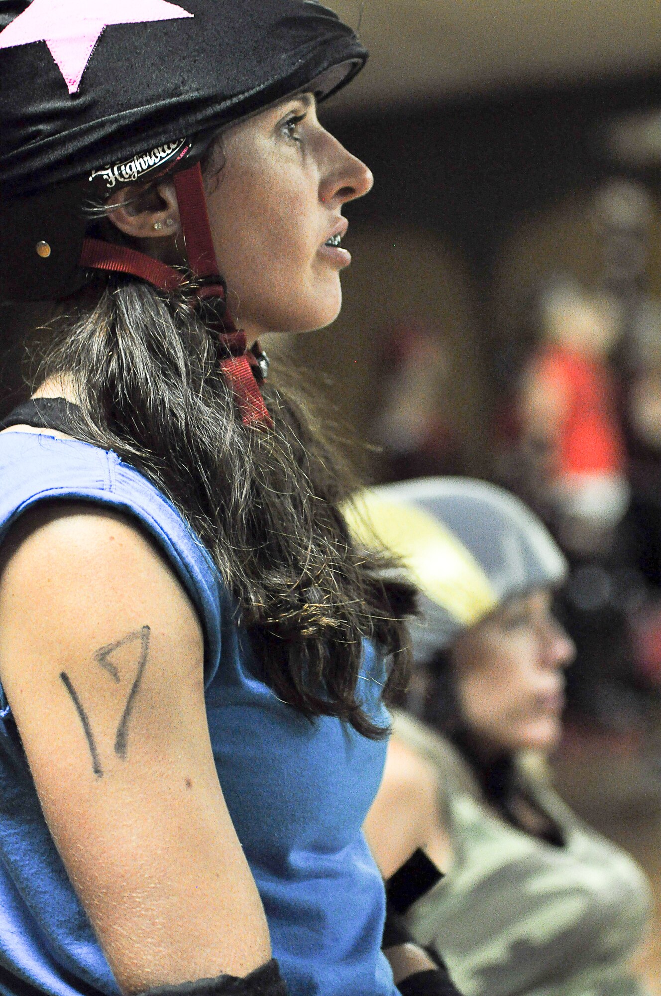 Capt. Molly Sanford is a mild-mannered C-17 pilot with the 300th Airlift Squadron.  But as Molly Mauls-A-Lot, she’s a fast-skating, hard-charging roller derby jammer ready to take on any bout thrown her way. (U.S. Air Force Photo by Master Sgt. Mary Hinson) 
