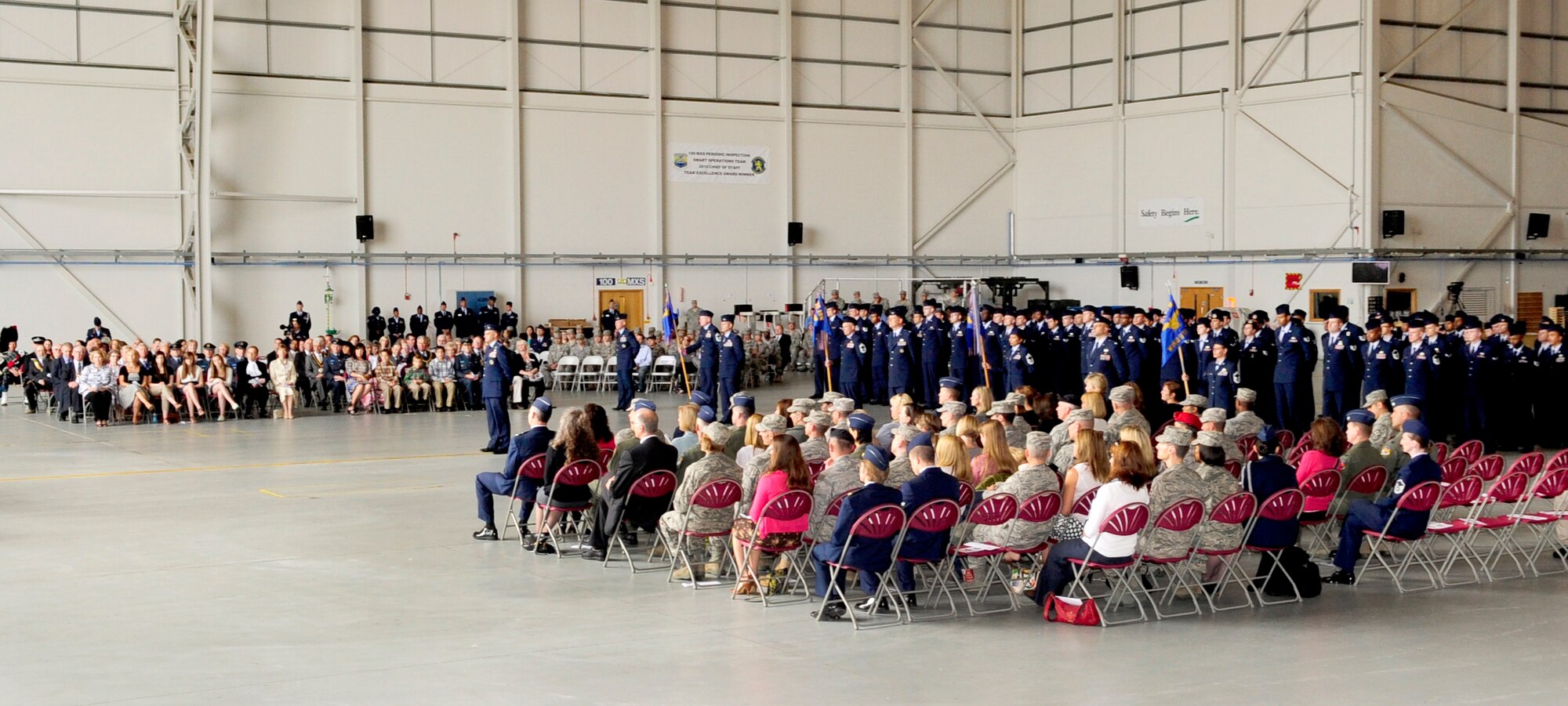 RAF MILDENHALL, England -- Team Mildenhall members attend the 100th Air Refueling Wing change of command at Hangar 814 here June 24, 2011. The change of command was held for the departure of Col. Chad Manske and the arrival of Col. Christopher Kulas. In addition to Team Mildenhall members, members of the local community, including Honorary Commanders and the British-American Council, attended the ceremony. (U.S. Air Force photo/Senior Airman Ethan Morgan)