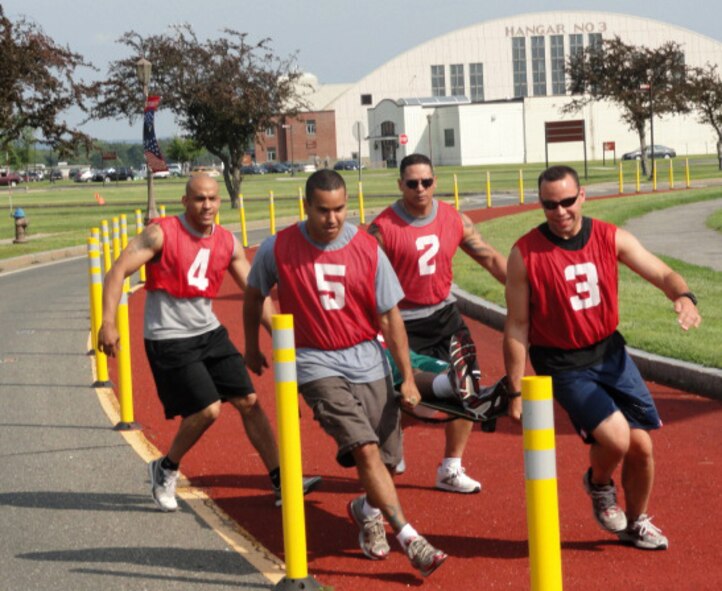 The Fitness Center held a “Readiness Relay” in June.  Events including a Humvee pull, sand bag stack, and relay race.  “I was so surprised at everyone’s intensity,” said event organizer Freeman Knowlton, Recreation staff member.  The MEPS team won the overall contest with a time of 10 minutes, 11 seconds, and 78 hundredths.  (The winner came down to hundredths, said Mr. Knowlton.)  The next event will be a 5K race along the Patriot Trail in August.  And another Readiness Relay is planned for September.  For more details, contact the Fitness Center at (413) 557-3958.