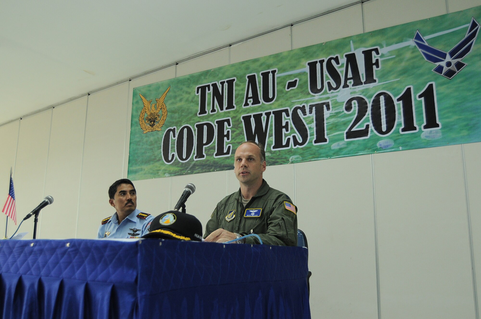 HALIM AIR BASE, Indonesia -- Lt. Col. Pete Kelley, Yokota's Cope West detachment commander, offers remarks to Indonesian and U.S. Airmen during the closing ceremony here June 24, 2011. More than 70 Airmen and three C-130 Hercules from Yokota Air Base, as well as one Indonesian Air Force C-130 participated in the week-long bilateral field training exercise which was designed to enhance the readiness and combined interoperability between the two Air Forces. (U.S. Air Force photo/Capt. Raymond Geoffroy)