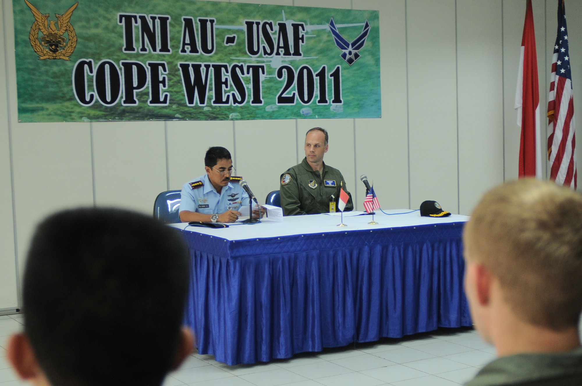 HALIM AIR BASE, Indonesia -- Col. Tri Bowo, 1st Air Wing commander with the Indonesian Air Force, offers remarks to during the closing ceremony for Exercise Cope West 11 here June 24, 2011. During the exercise, Airmen from Indonesia and the U.S. worked side-by-side, both on the ground and in the air, to hone their skills for possible future real-world contingency operations. (U.S. Air Force photo/Capt. Raymond Geoffroy)