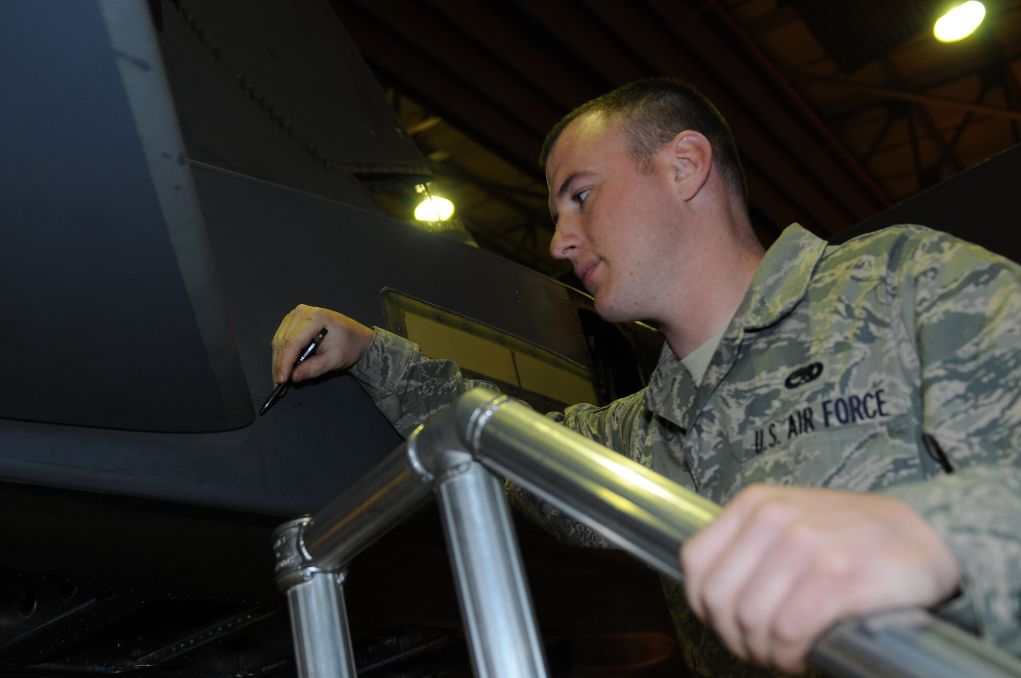 ROYAL AIR FORCE LAKENHEATH, England - Senior Airman Shane Krafka, 48th Equipment Maintenance Squadron repair and reclamation journeyman, marks areas for an stabilization actuator on an F-15E Strike Eagle in Hangar 7 on June 22, 2011. Airman Krafka was nominated for a Liberty Spotlight because he displays the core value of 'Excellence in All We Do'. (U.S. Air Force photo/Airman Cory Payne)