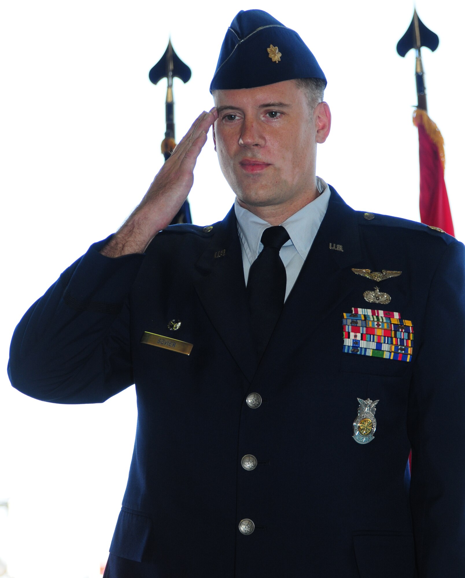 Maj. John Sevier returns his first salute as the new 39th Civil Engineer Squadron commander during the 39th CES change-of-command ceremony, June 23, 2011, at Incirlik Air Base, Turkey.  As commander, Major Sevier will oversee readiness planning and training, explosive ordinance disposal, fire and environmental protection, and housing services to approximately 4,300 people. (U.S. Air Force photo by Senior Airman Anthony Sanchelli/Released)