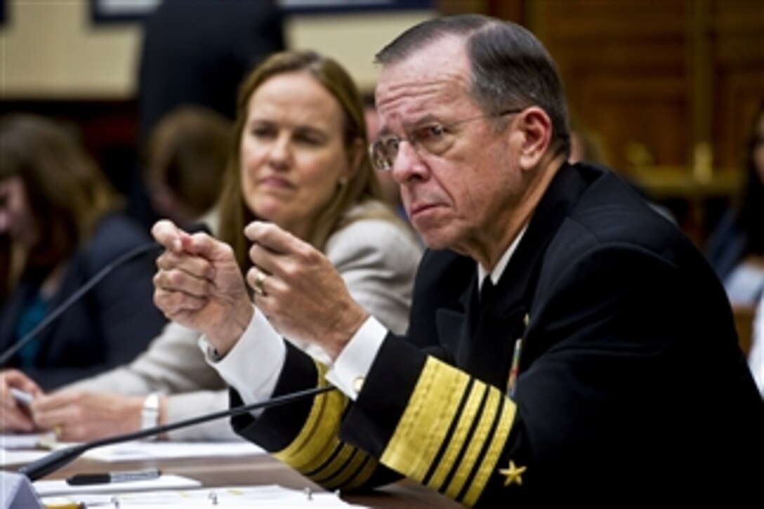 Chairman of the Joint Chiefs of Staff Adm. Mike Mullen and Under Secretary of Defense for Policy Michele Flournoy testify on Afghanistan and Pakistan at a hearing before the House Armed Services Committee in Washington, D.C., on June 23, 2011.  