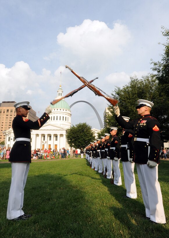 Cpl. Oscar Franquez Jr. and Lance Cpl. Michael Madulka, members of the Marine Corps Silent Drill Platoon inspection team, warm up before a performance at Marine Week 2011 in St. Louis June 25. The platoon traveled to St. Louis to perform two shows, one under the Gateway Arch and another during the closing ceremonies for Marine Week.