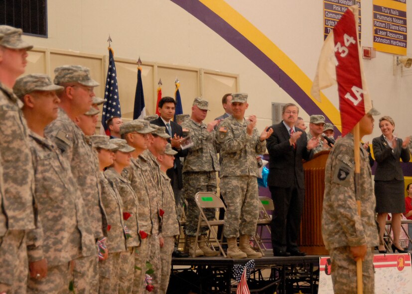 Governor Terry Branstad and Maj. Gen. Timothy Orr welcome back the 64 soldiers and airmen from the 734th Agri-Business Development Team (ADT)  on June 25, 2011, at   Johnston High School, Johnston, Iowa. The 734th ADT was the first joint Iowa Army and Air National Guard unit to be deployed overseas. USAF Photo TSGT Brian Cox (Released).