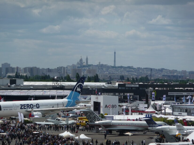 The 49th International Paris Air Show took place June 20-26, 2011. The U.S. had 11 aircraft on display. From the tail of the C-5M Super Galaxy is a view of the air show grounds and in the distance the La Basilique du Sacré Coeur de Montmartre (on left) and the Eiffel Tower (right). The Paris Air Show takes place every two years at Le Bourget Airport, about 10 miles north of downtown Paris. (U.S. Air Force photo/Tech. Sgt. Francesca Popp)