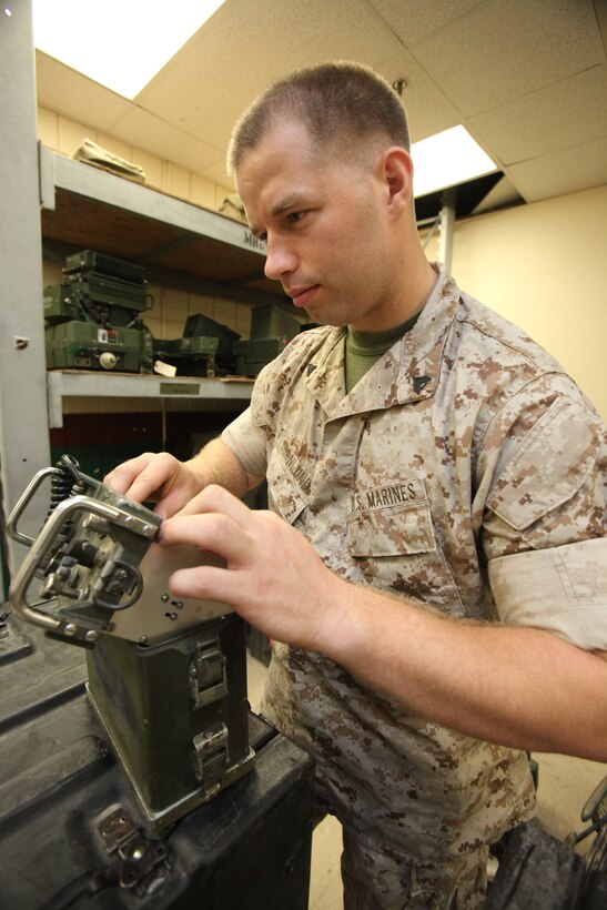 Cpl. Donald L. Gronlund, a radio technician with Marine Wing Communications Squadron 28, does his job as he is highlighted for the Cherry Point Windsock flyby.