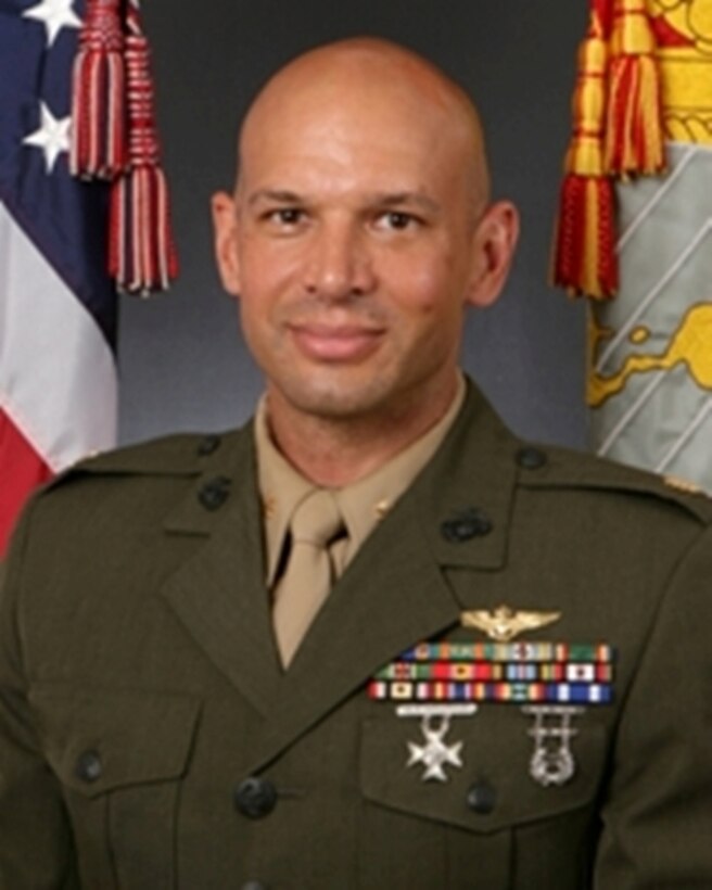 Maj. Joshua S. K. Gordon, the commanding officer of Marine Tactical Electronic Wargare Squadron 1, poses for a photo.