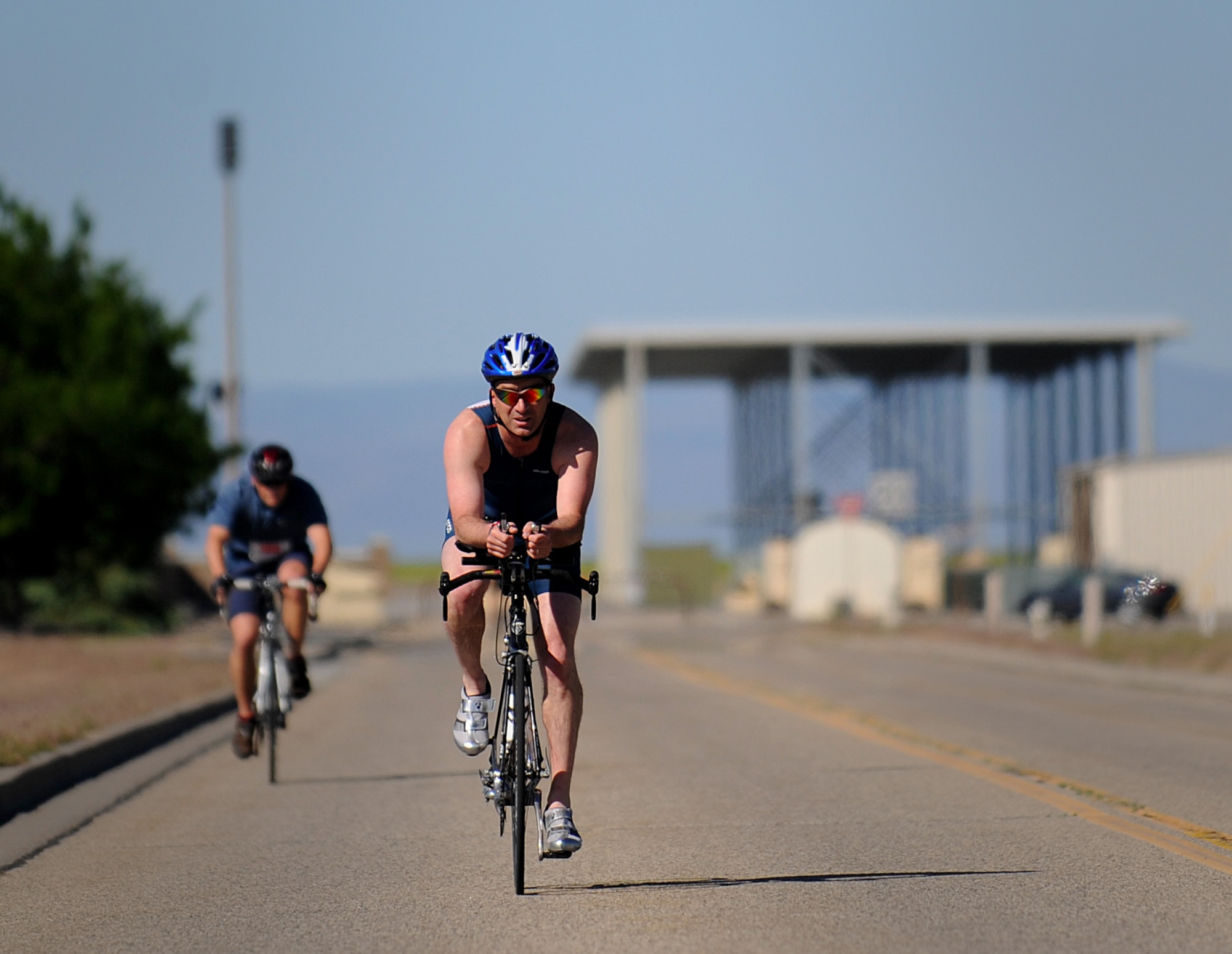 MOUNTAIN HOME AIR FORCE BASE, Idaho – Participants in the first heat of the base triathlon finish their last bike lap here June 25. With over 30 participants, each heat had a total number of eight people. (U.S. Air Force photo by Staff Sgt. Gina Chiaverotti-Paige)