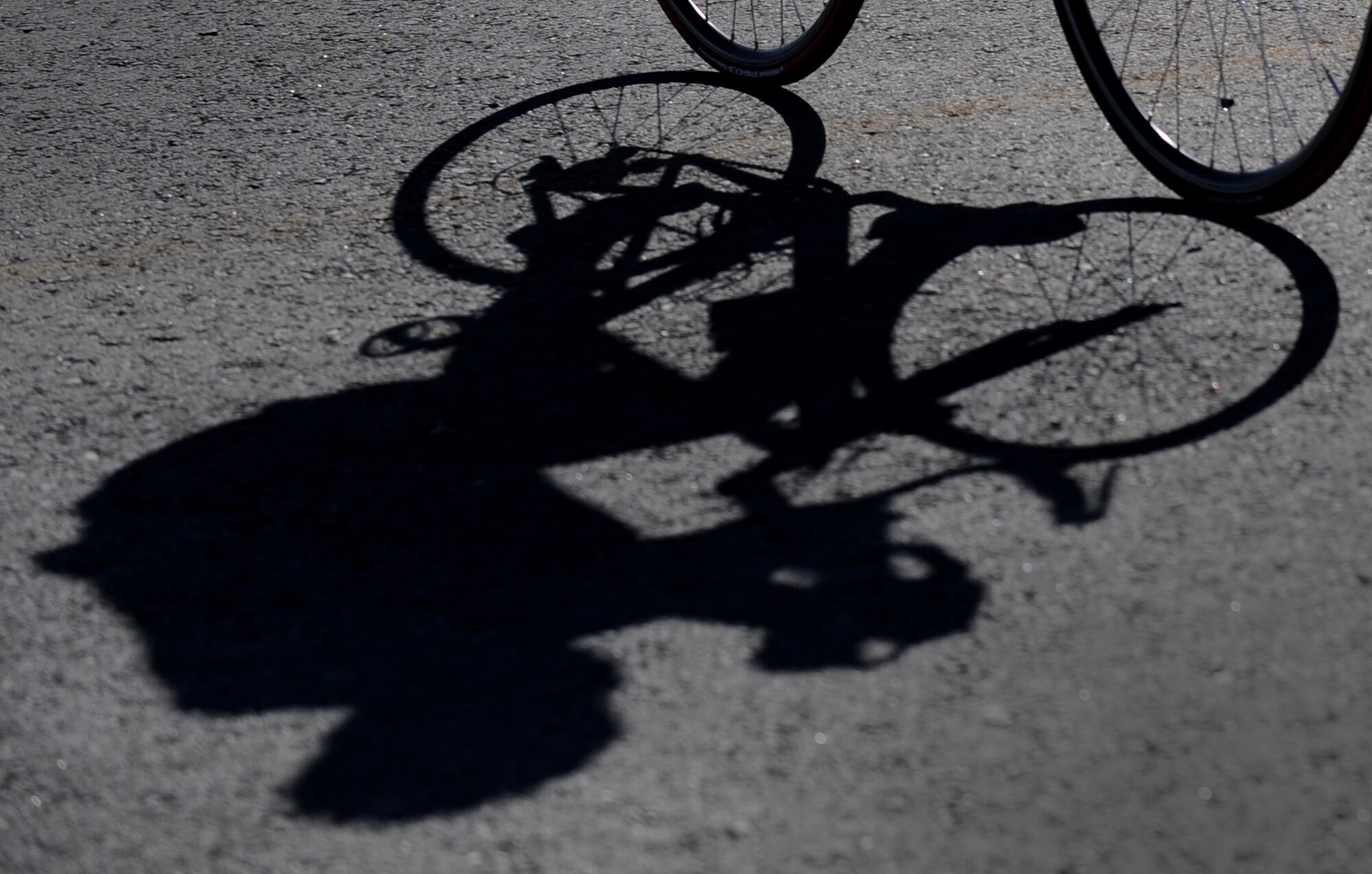 MOUNTAIN HOME AIR FORCE BASE, Idaho – A participant conquers the 20 kilometer bike ride during a triathlon here June 25. After completing the bike portion of the course, the participants completed a five kilometer run. (U.S. Air Force photo by Staff Sgt. Gina Chiaverotti-Paige)