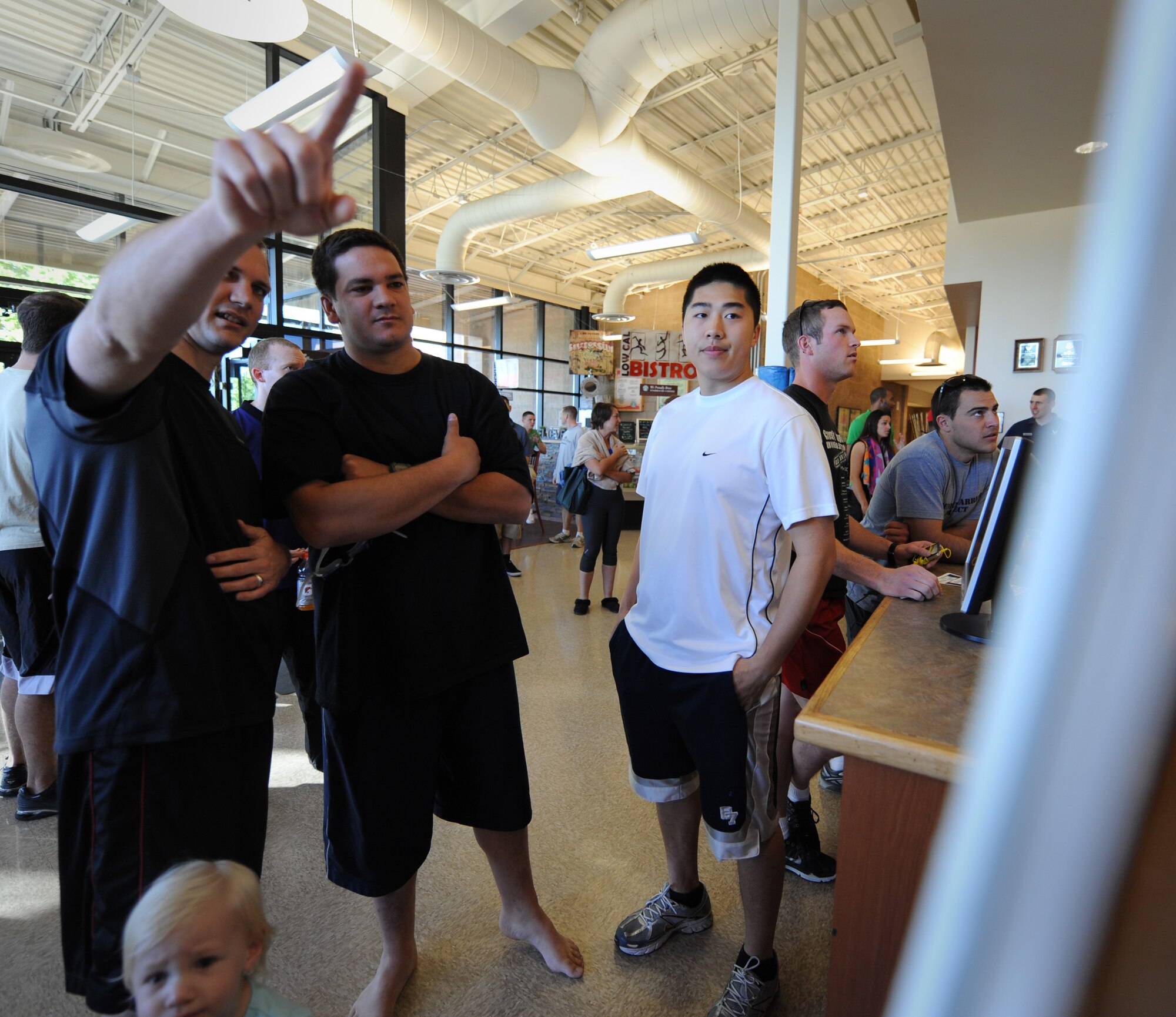 MOUNTAIN HOME AIR FORCE BASE, Idaho – Participants looks over a course map before beginning a triathlon here June 25. The event had over 30 participants ranging from beginner to competitive athletes. (U.S. Air Force photo by Staff Sgt. Gina Chiaverotti-Paige)