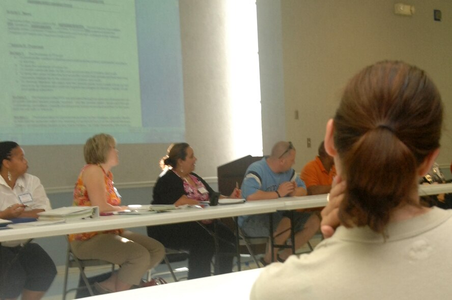 A member of the newly-formed Barksdale PTA listens as members of the PTA board give their opening remarks during their first meeting June 23. The Barksdale PTA is a community PTA, working with schools in the local area. (U.S. Air Force photo/Senior Airman Allison M. Boehm)(RELEASED)