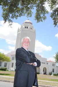Scott Shepherd, 902nd Civil Engineer Squadron, and winner of the Historic Preservation Award, poses for a photo in front of the 12th Flying Training Wing Headquarters (the Taj) on Randolph AFB June 27, 2011 (U.S. Air Force photo/Rich McFadden) (released)