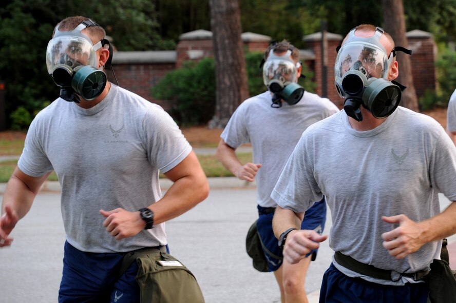 Members of the 437th Aircraft Maintenance Squadron finish their physical training session with a gas mask run June 22 at Joint Base Charleston, S.C. Members from the 437th Aerial Port Squadron and the 437th AMXS met every Wednesday to prepare for the 2011 Air Mobility Rodeo held by Air Mobility Command at Joint Base Lewis-McCord, Wash. (U.S. Air Force Photo/Staff Sgt. Nicole Mickle) 

