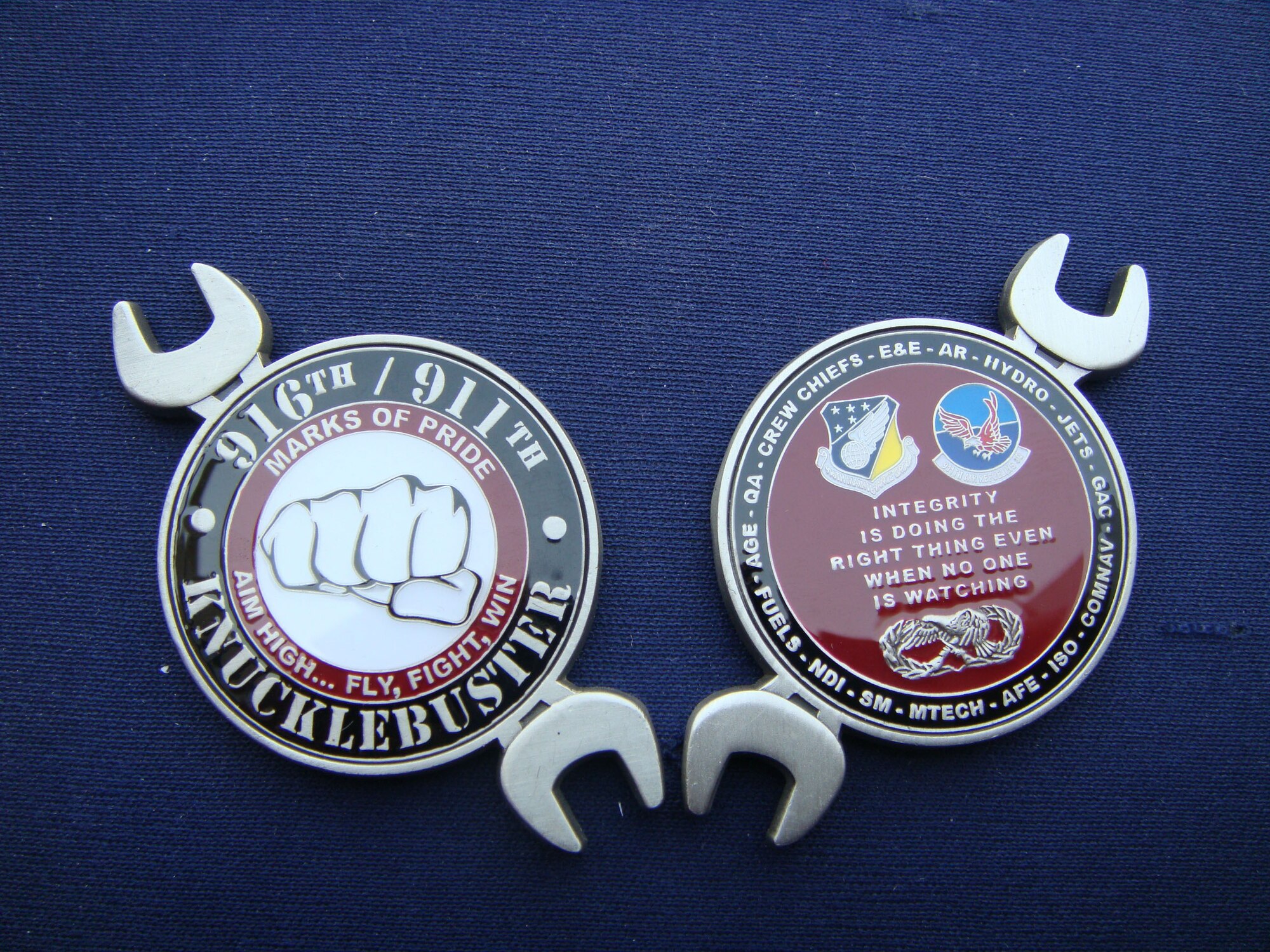 The Knucklebuster coin presented by the 916th Maintenance Group commander and the 911th Air Refueling Squadron commander. (USAF photo courtesy of the 911ARS)