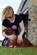 Staff Sgt. Samantha Plemons, 2nd Aerospace Medicine Squadron, plays with Moe, an adoptable pet, at the Bossier City Animal Control Hand-in-Paw Adoption Day in Bossier City, La., June 25. Sergeant Plemons has been assisting with animal control since 2004 and co-founded the Hand-in-Paw program shortly after. (U.S. Air Force photo/Senior Airman Joanna M. Kresge)