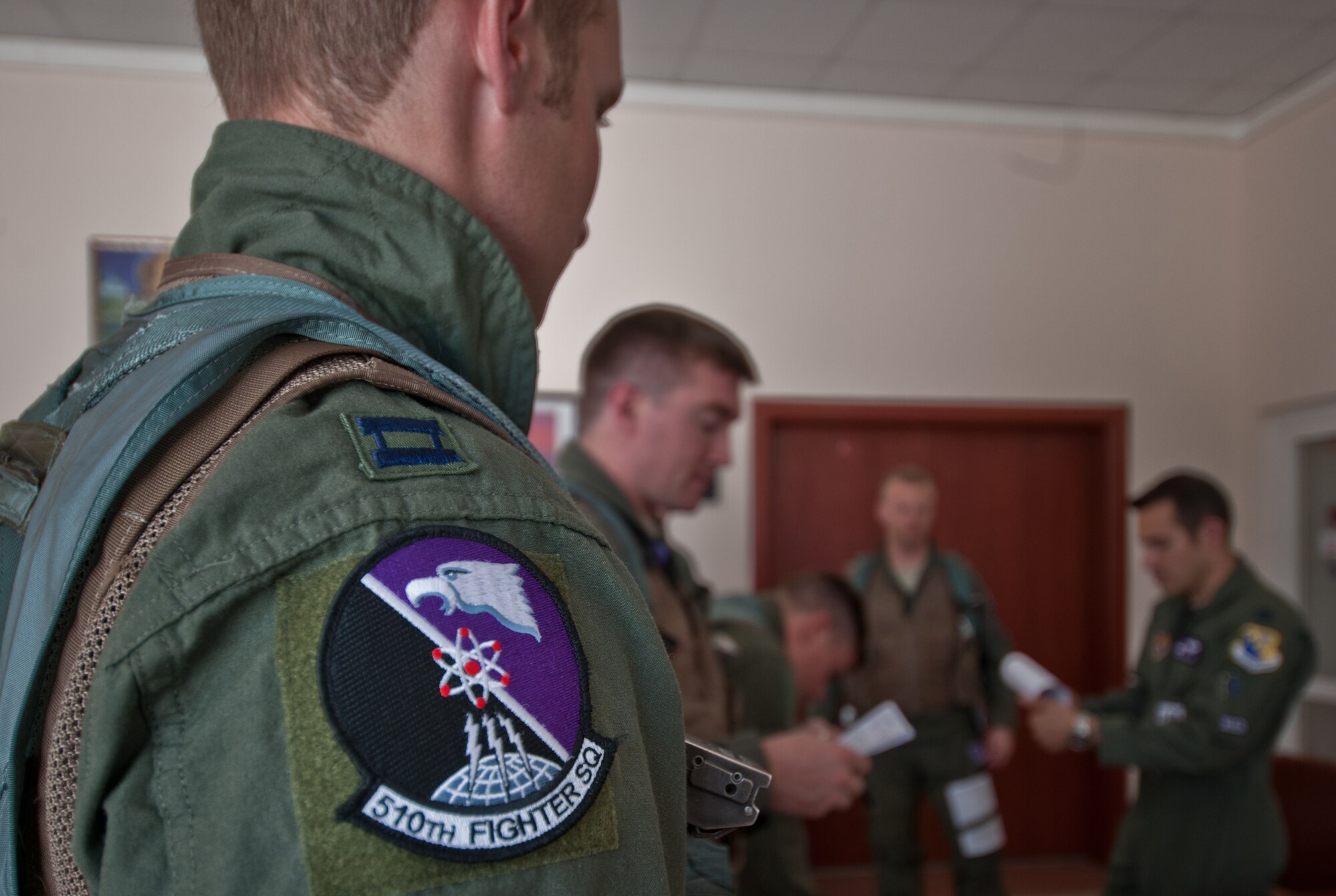 Pilots attend a preflight briefing June 21, 2011, during Anatolian Eagle at Konya Air Base, Turkey. (U.S. Air Force photo/Staff Sgt. Alexandre Montes)