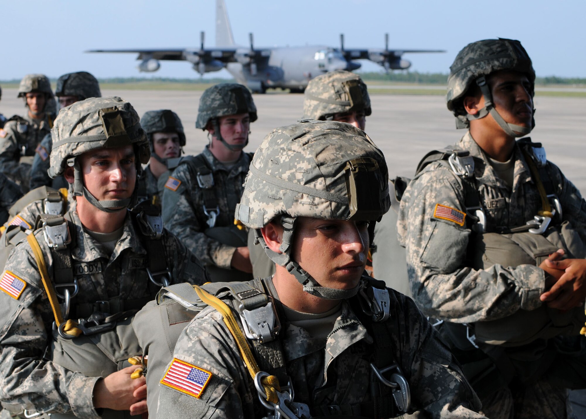 Army privates, students awaiting training at the U.S. Army Airborne School, wait to board the aircraft for a simulated jump on the flightline at Duke Field, Fla., June 14. The production company, WILL Interactive, started work on a choose-your-own-adventure film for Department of Defense jumpmaster training at Fort Benning, Ga., with help from members from the U.S. Army Airborne School. However, when the crew needed a C-130 in portions of the video, the 919th Special Operations Wing offered to support the project at Duke Field June 13-15. (U.S. Air Force photo/Tech. Sgt. Cheryl Foster)