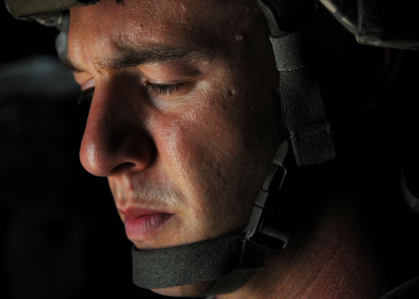Steve Helmkamp, an actor, prepares for his next scene on Duke Field, Fla., June 14. The production company, WILL Interactive, started work on a choose-your-own-adventure film for Department of Defense jumpmaster training at Fort Benning, Ga., with help from members from the U.S. Army Airborne School. However, when the crew needed a C-130 in portions of the video, the 919th Special Operations Wing offered to support the project at Duke Field June 13-15. (U.S. Air Force photo/Tech. Sgt. Cheryl Foster)
