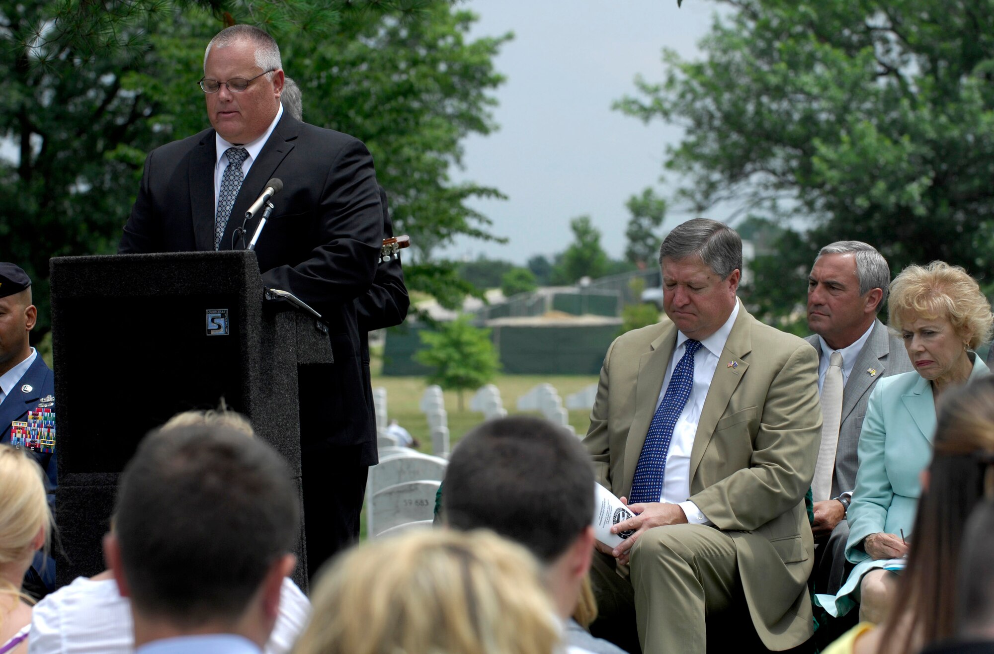 Retired Master Sgt. Eric Ziegler addresses guests during a remembrance ceremony, June 25, 2011, at Arlington National Cemetery, Va., to mark the 15th anniversary since the Khobar Towers bombing. Nineteen Airmen were killed in the terrorist bombing, June 25, 1996, at Dhahran Air Base, Saudi Arabia. (U.S. Air Force photo/Staff Sgt. Tiffany Trojca)