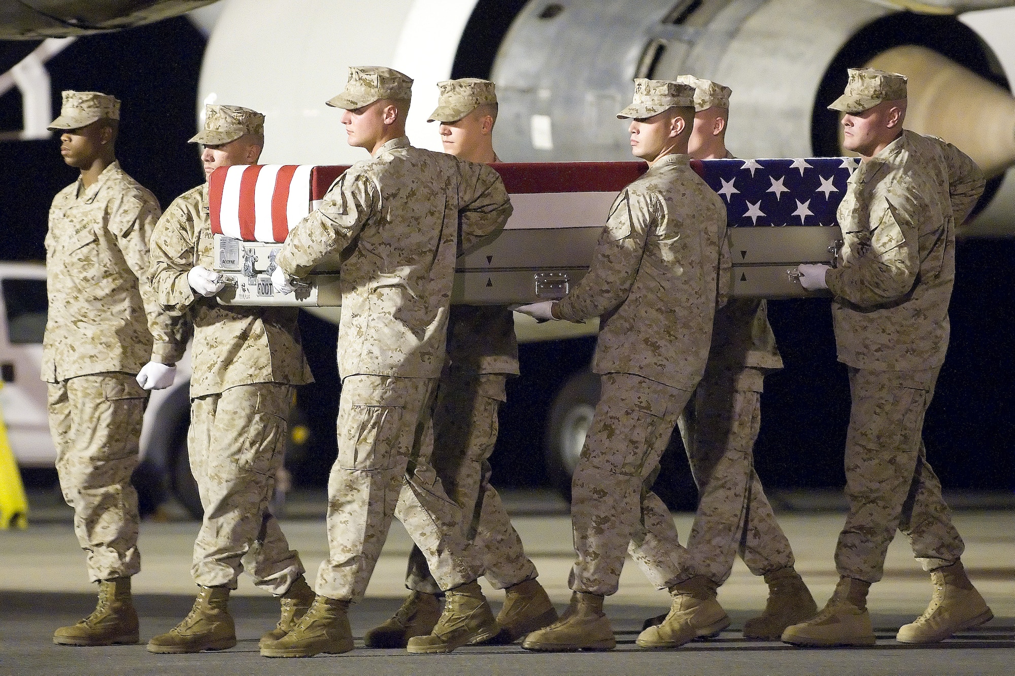 A U.S. Marine Corps carry team transfers the remains of Marine Cpl. Gurpreet Singh, of Antelope, Calif., at Dover Air Force Base, Del., June 25, 2011. Singh was assigned to the 1st Battalion, 5th Marine Regiment, 1st Marine Division, Camp Pendleton, Calif. (U.S. Air Force photo/Adrian Rowan)
