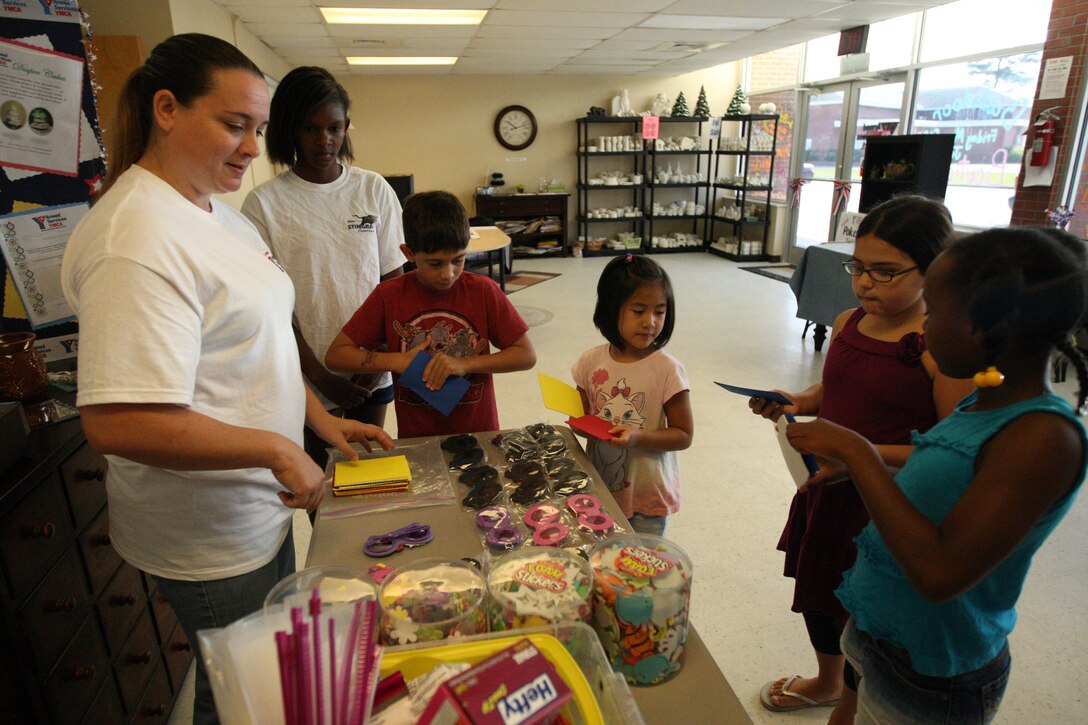 Arts and crafts supplies are collected together on a table for children to use during the Crafty Campers event hosted by Armed Services YMCA at Tarawa Terrace aboard the Marine Corps Base Camp Lejeune housing area, June 28. The event was one of six weekly events offered in Crafty Campers from June 28 though Aug. 2.