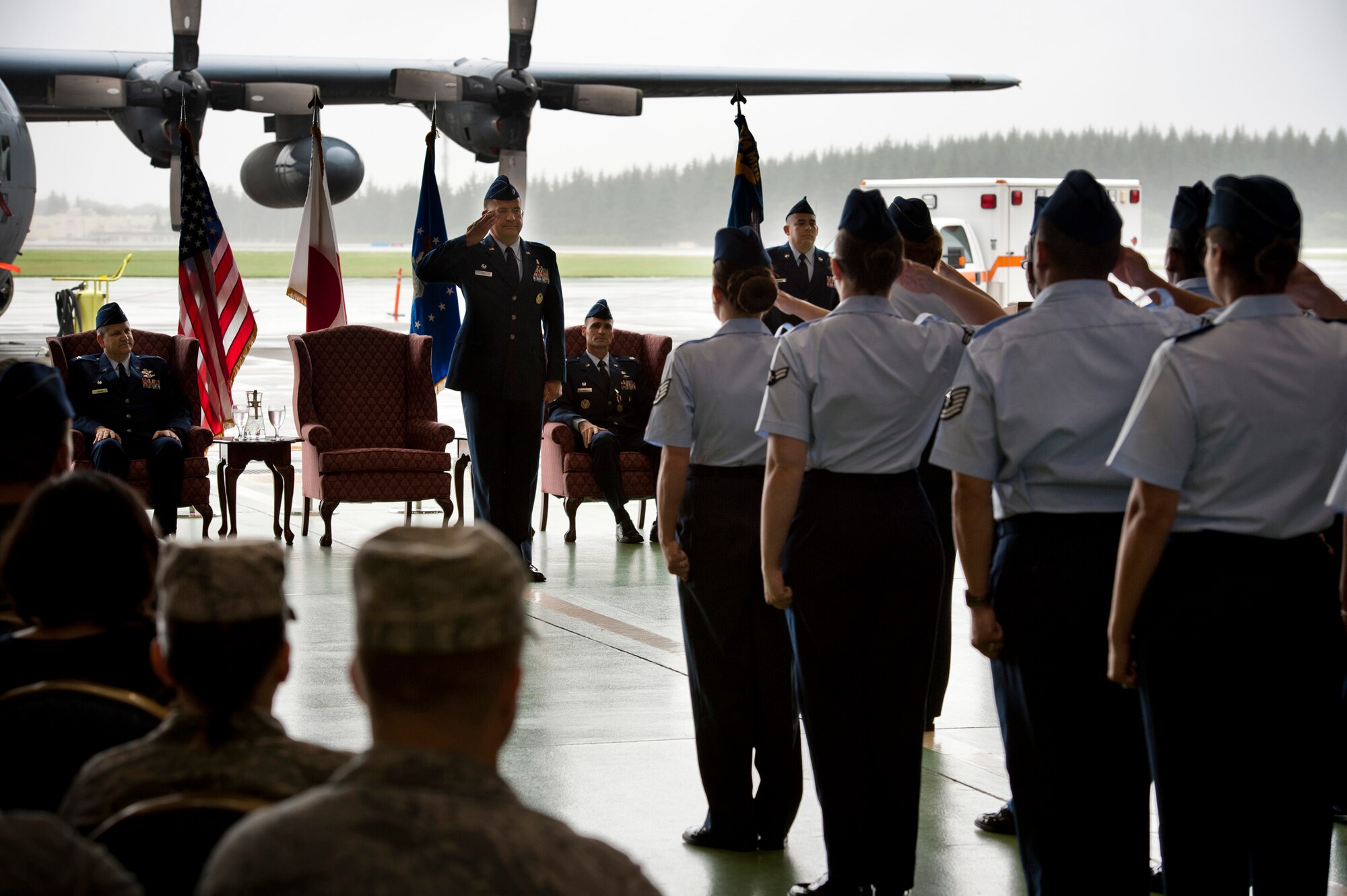YOKOTA AIR BASE, Japan -- Lt. Col. James Poel, 374th Aerospace Medicine Squadron commander, salutes his squadron for the first time at Yokota Air Base, Japan, June 16, 2011. This is Colonel Poel's first squadron command of his career. (U.S. Air Force photo/Staff Sgt. Samuel Morse)