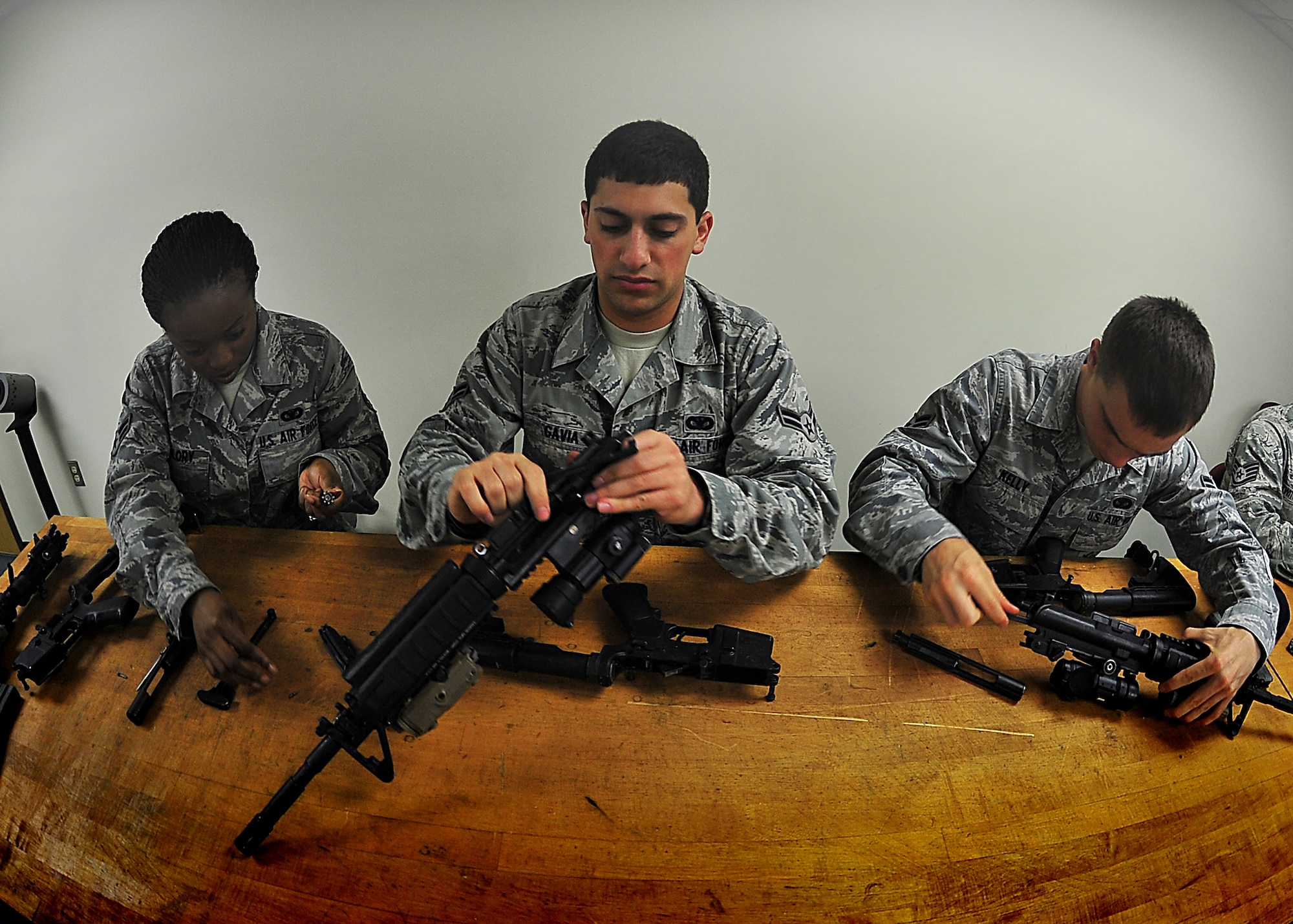 Members of the 51st Fighter Wing Security Forces Squadron received weapons training/ qualification at Osan Air Base, June 23.  Weapons training/ qualification are required for each member to perform their primary duties.  The SF members’ disassembled, cleaned, and reassembled their M4 Carbine riffle.  During the class members received breathing and shooting techniques to successfully make contact with the target.  Security Forces members are responsible for ensuring the safety of bases, weapons, property and personnel from hostile forces.  (U.S. Air Force Photo/Staff Sgt. Daylena Gonzalez)