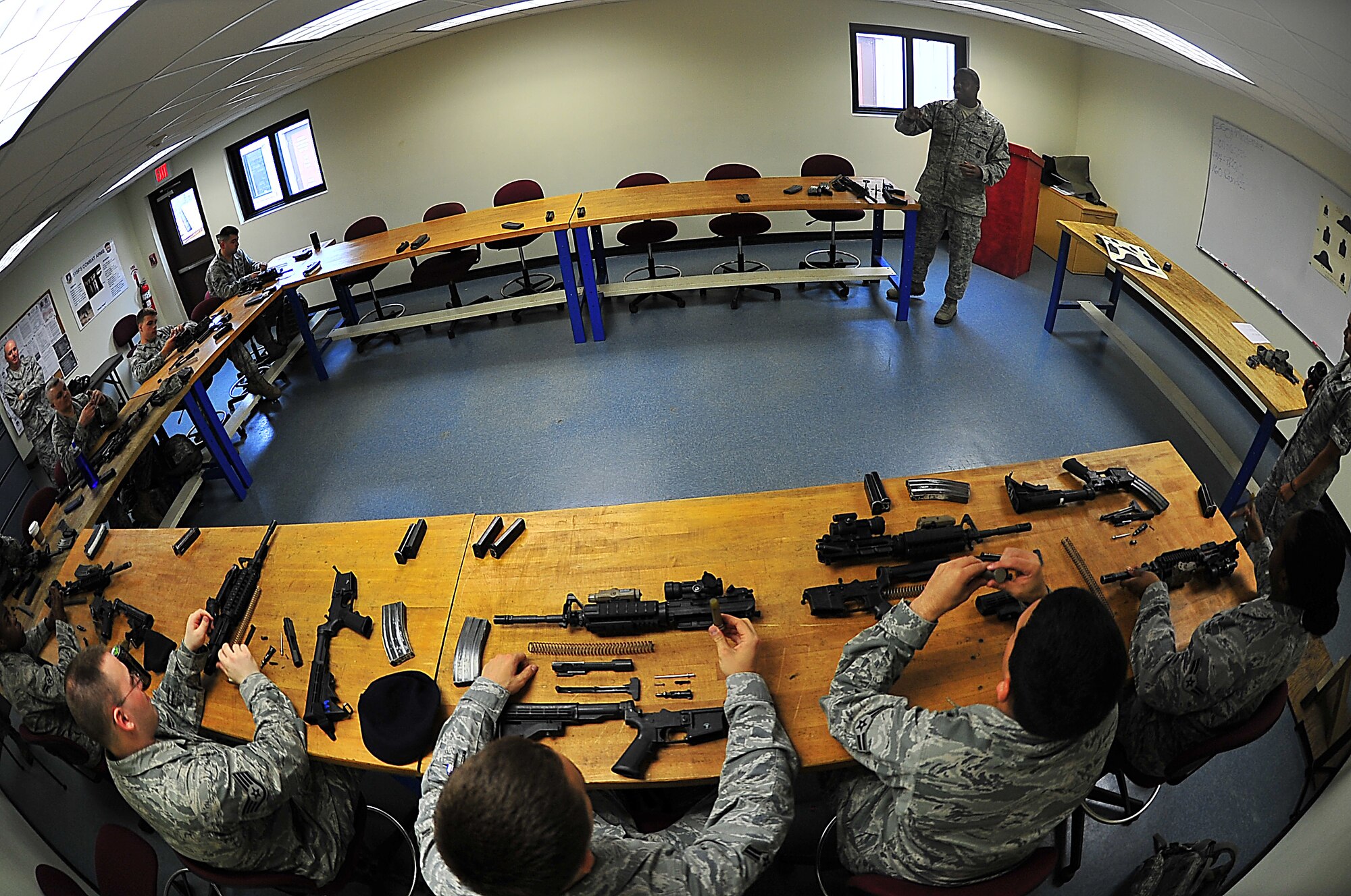 Members of the 51st Fighter Wing Security Forces Squadron received weapons training/ qualification at Osan Air Base, June 23.  Weapons training/ qualification are required for each member to perform their primary duties.  The SF members’ disassembled, cleaned, and reassembled their M4 Carbine riffle.  During the class members received breathing and shooting techniques to successfully make contact with the target.  Security Forces members are responsible for ensuring the safety of bases, weapons, property and personnel from hostile forces.  (U.S. Air Force Photo/Staff Sgt. Daylena Gonzalez)