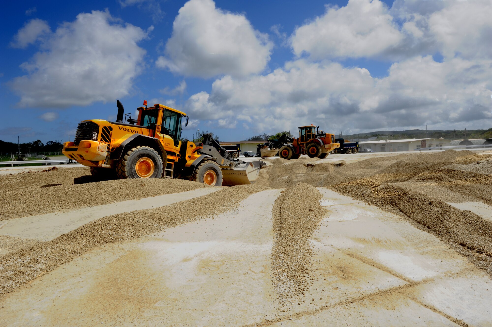 Civil engineers practice reconstituting a damaged airfield following air attacks during Silver Flag 11-06 at Kadena Air Base, Japan, June 28.  Silver Flag is a week-long exercise where Airmen train on how to open, establish and sustain a forward-operating base before they deploy to real-world operations. (U.S. Air Force photo/Airman 1st Class Jarvie Z. Wallace)