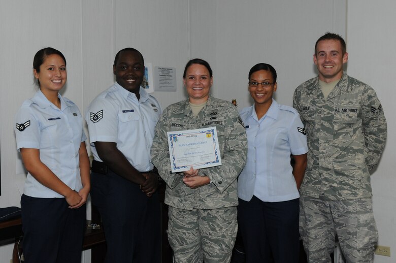 Staff Sgt. Beth Del Vecchio, 36th Wing Public Affairs chief, was awarded Andersen's Best here June 20. (U.S. Air Force photo/Brig. Gen. John Doucette)