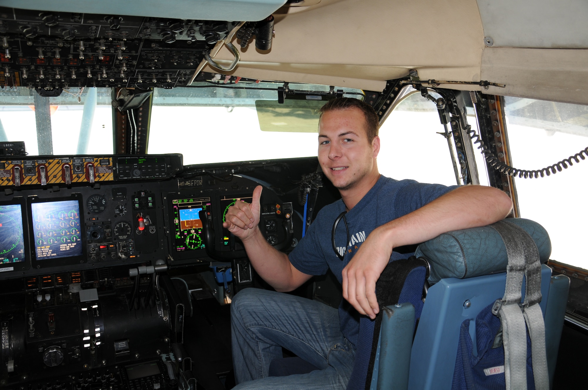 Rollie Moore, Jr., of Rollie's Tavern in Tacoma, Wash., takes his turn in the pilot seat of a C-5 Galaxy at Travis Air Force Base in Fairfield, Calif.  Mr. Moore particpated in the June 23-24 civic leader tour hosted by the 446th Airlift Wing. (U.S. Air Force photo by 2nd Lt. Denise Hauser)