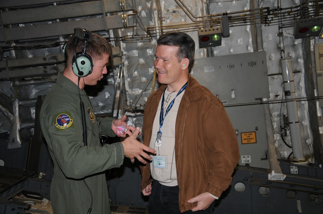 Senior Airmen Mitch Williams teaches Rod Wittmier of Vets meet Vets in Buckley, Wash.,  about the C-17 Globemaster III during the June 23-24 Civic Leader tour hosted by the 446th Airlift Wing.  The 446th AW escorted 40 civic leaders to March Air Reseve Base in Riverside, Calif., and Travis Air Force Base in Fairfield, CA. (U.S. Air Force photo by 2nd Lt. Denise Hauser)