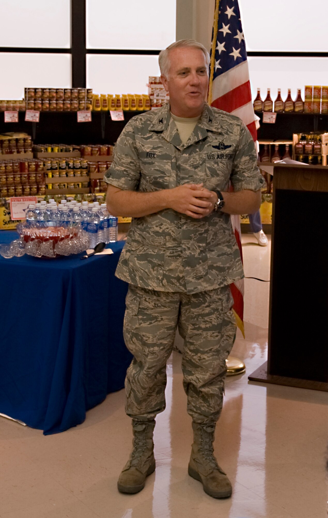 Col. Kevin Fox, 99th Mission Support Group commander, speaks during the Scholarships for Military Children ceremony, Nellis Air Force Base, Nev., June 24, 2011.  The four scholarship recipients were selected based on academic merit, the quality of their essays, and their participation in extracurricular and volunteer activities. (U.S Air Force photo by Senior Airman Stephanie Rubi / Released)
