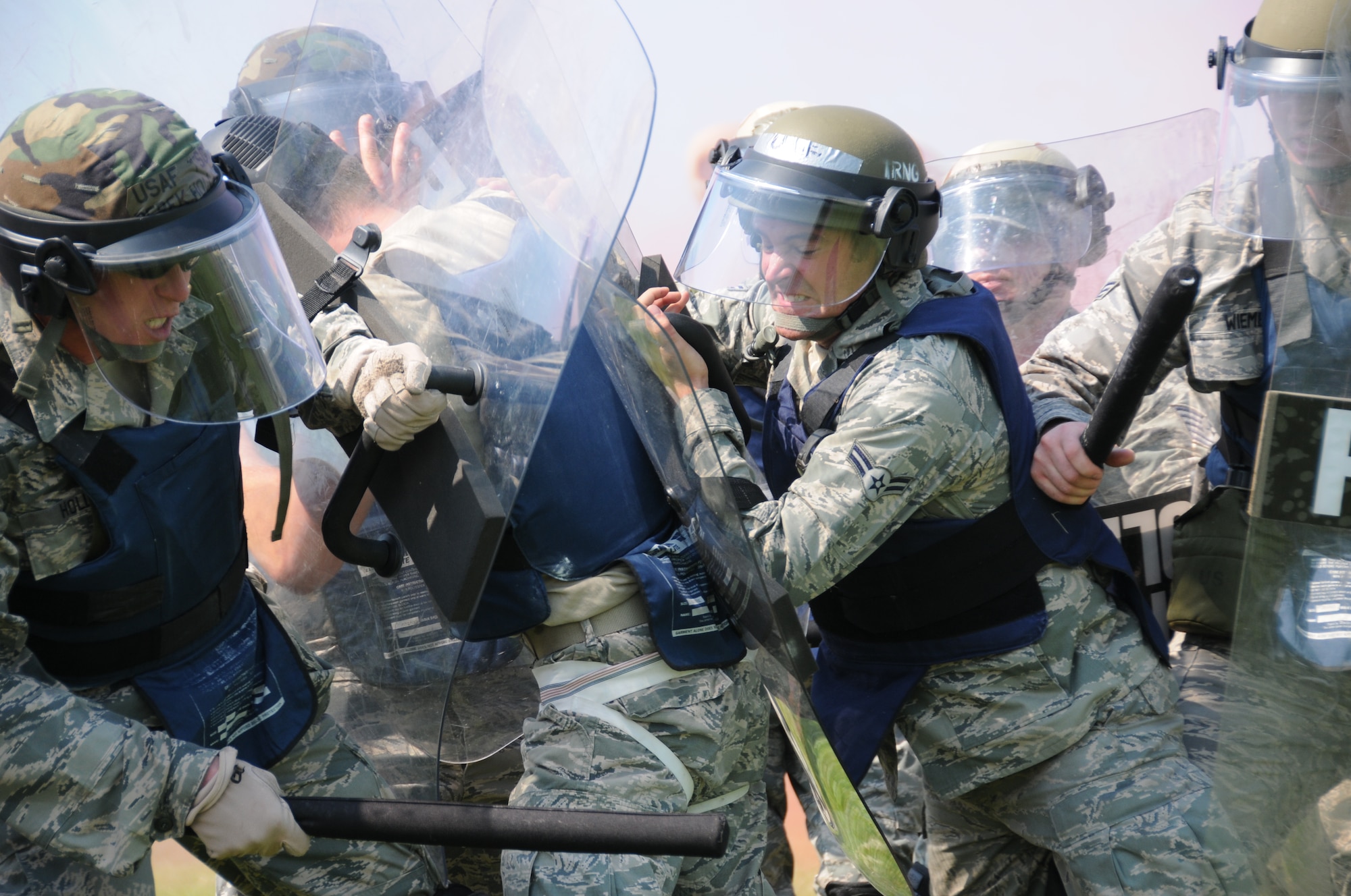 Members of the Nebraska Air National Guard Response Force team "extract" a simulated protestor during a National Guard Response Force training exercise held at the Nebraska Air National Guard parade grounds on June 5, 2011 in Lincoln, Neb. (Nebraska Air National Guard photo by Senior Airman James Lieth)