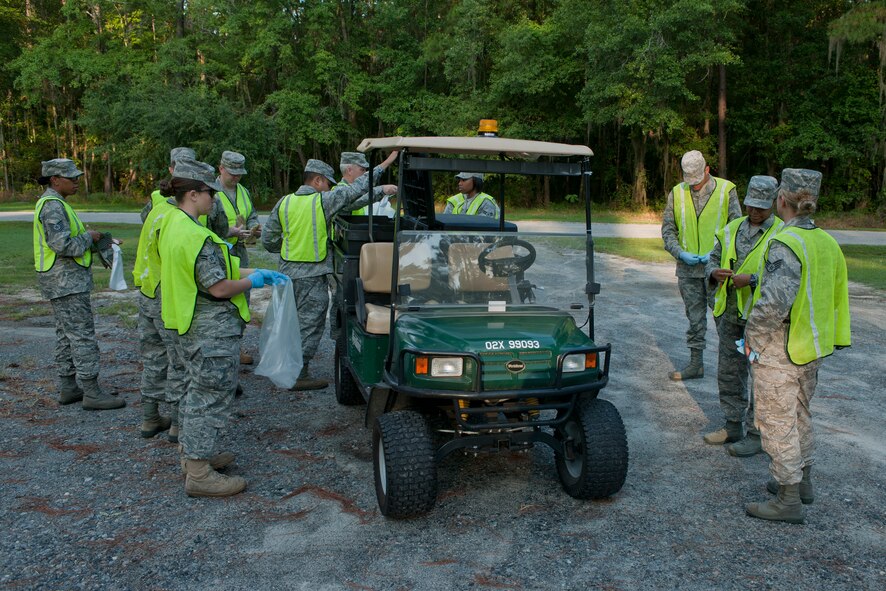 Members of the 23rd Wing staff agencies meet the morning of June 28, 2011, to begin a Pride Patrol at Moody Air Force Base, Ga. The patrol is a voluntary event where a different squadron cleans up around Moody’s gates each week to keep the area nice and clean. (U.S. Air Force photo by Senior Airman Benjamin Wiseman/Released)