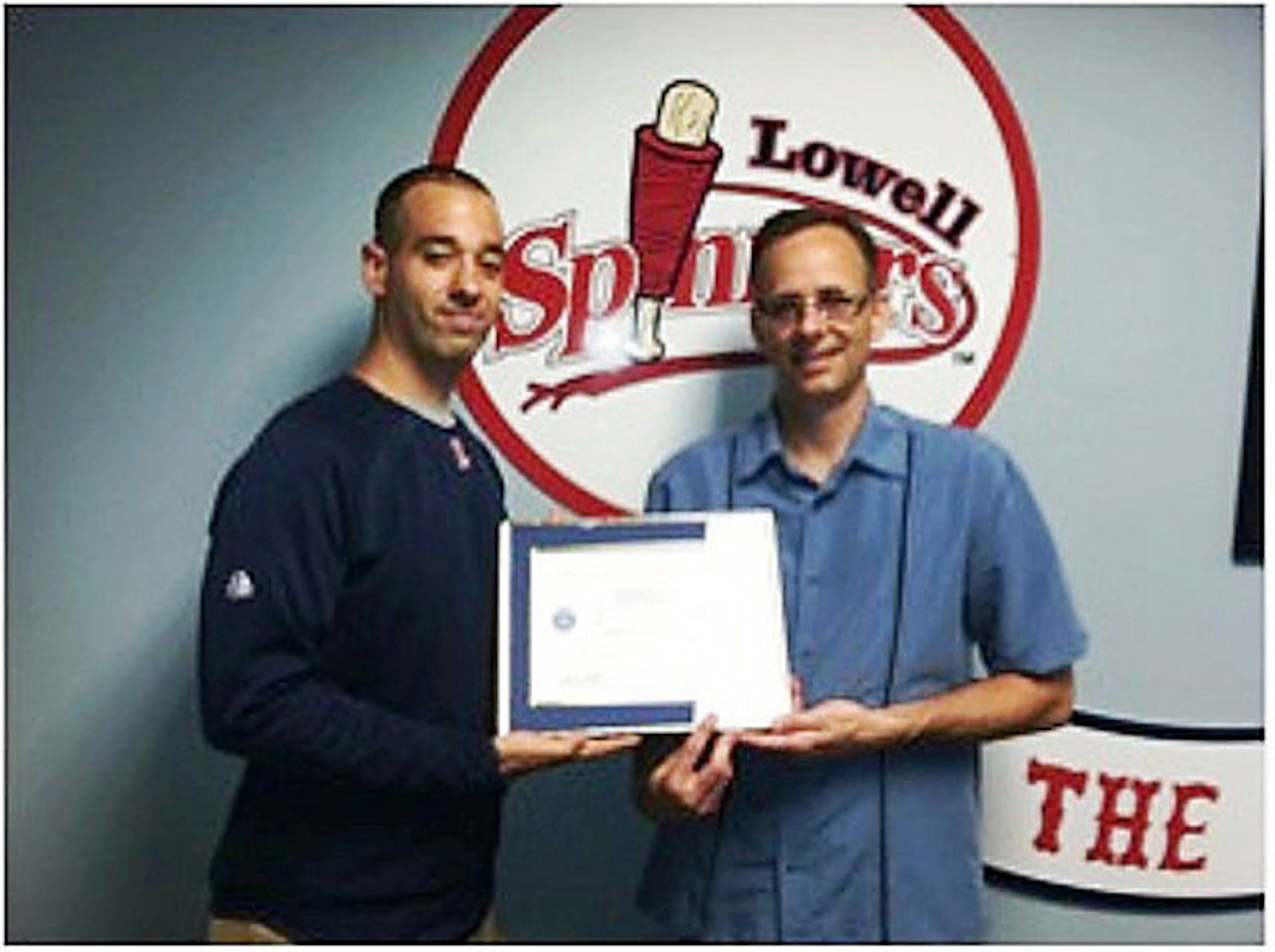 On May 31, 2011, President and General Manager Tim Bawmann of the Lowell Spinners professional baseball team accepted the prestigious Patriot Award.  He was recommended for his exceptional support of his employee, U.S. Air Force Reserve Airman First Class Jeffrey Paolino.  Shown here is  A1C Jeffrey Paolino and Tim Bawmann. (courtesy photo)