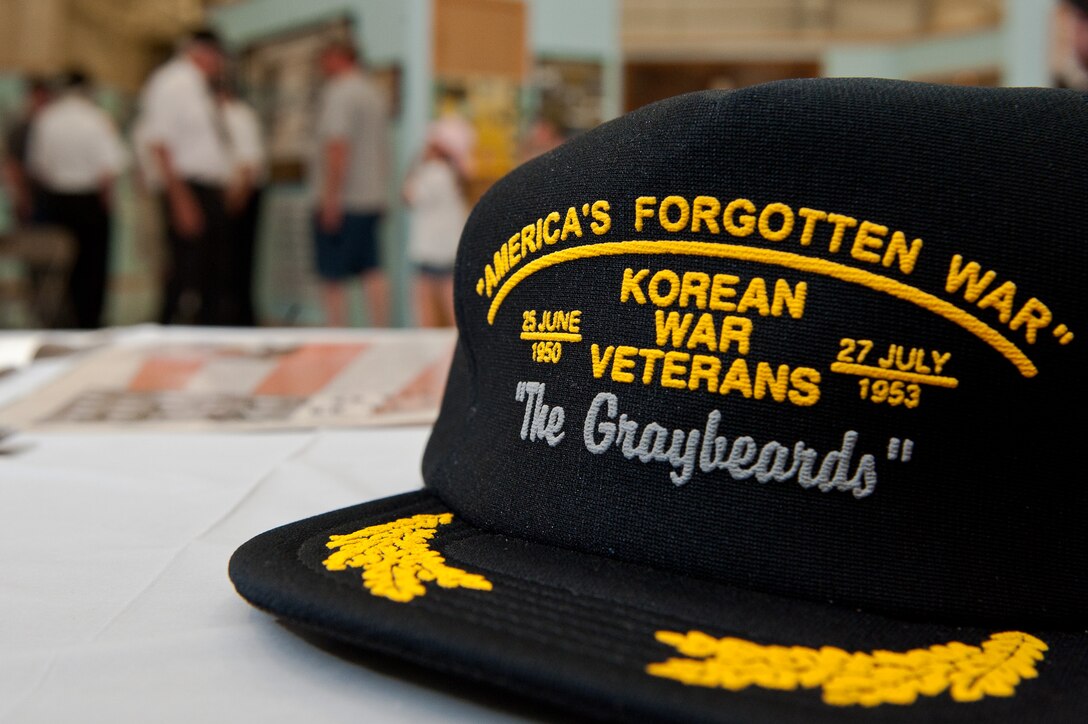 Korean War veterans speak to South Dakota Air and Space Museum visitors June 25 to commemorate the 61st anniversary of the start of the Korean War. The war vets set up memorabilia and displays to help educate the public on “America’s Forgotten War.” (U.S. Air Force photo/Tech. Sgt. Nathan Gallahan/released)