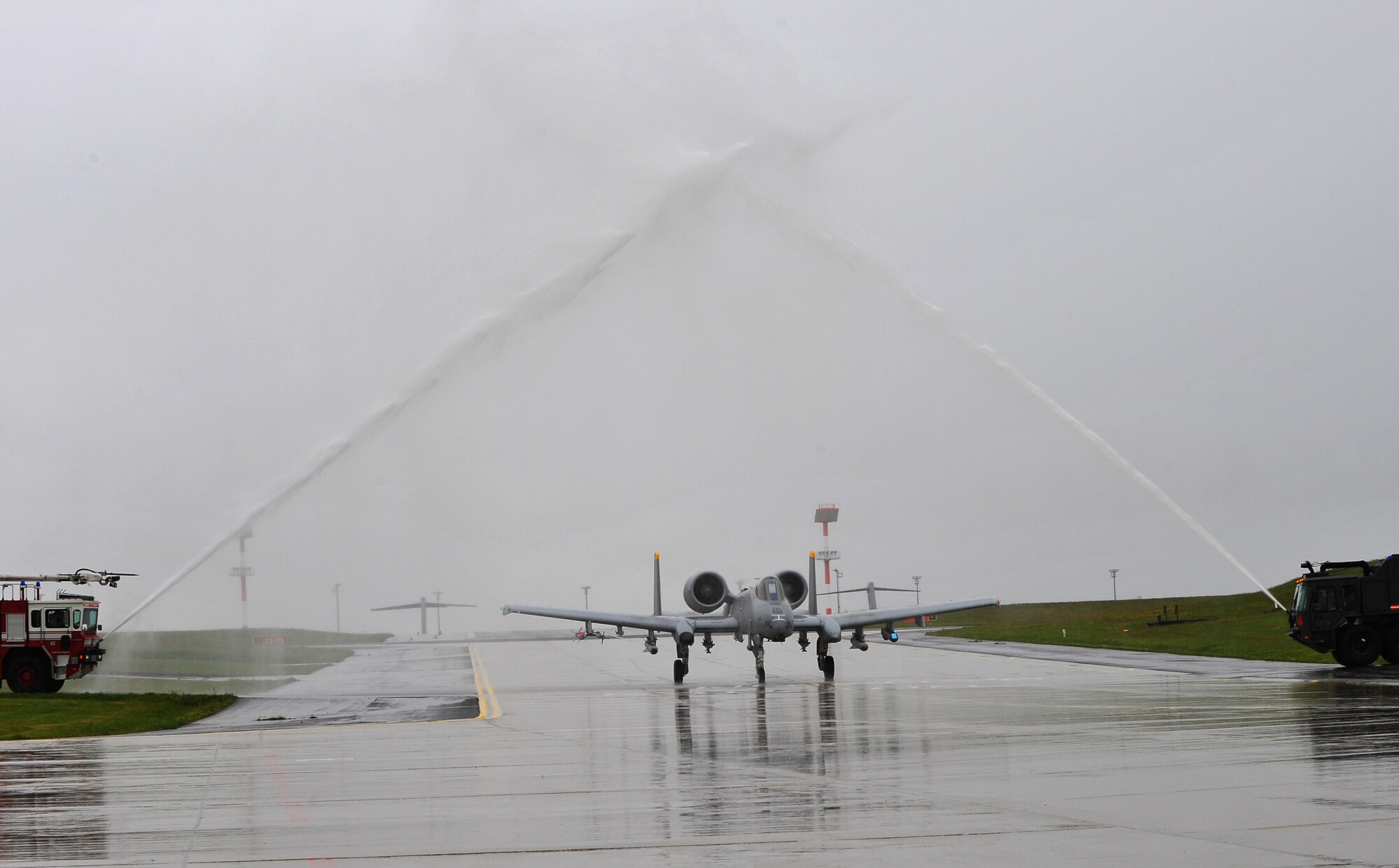 SPANGDAHLEM AIR BASE, Germany – Col. Jackson Fox, 52nd Operations Group commander, taxis an A-10 Thunderbolt II under streams of water after his final flight here June 24. Colonel Fox celebrated his last A-10 Thunderbolt II flight at Spangdahlem Air Base with family, friends and coworkers before taking command of the 39th Air Base Group at Incirlik Air Base, Turkey. (U.S. Air Force photo/Airman 1st Class Dillon Davis)