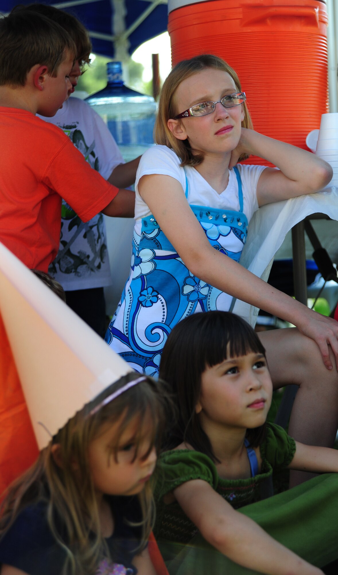Sara Sesker, wife of Tech. Sgt. Gail Sesker, 39th Communications Squadron airfield systems technician, reads to children during the Summer Reading Kick-Off event June 24, 2011, at Incirlik Air Base, Turkey.  The reading event was a way for children to celebrate summer reading and receive encouragement to read through the summer. (U.S. Air Force photo by Senior Airman Anthony Sanchelli/Released)