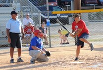 LAUGHLIN AIR FORCE BASE, Texas – Tech. Sgt. Terry Logston, 47th Civil Engineer Squadron, prepares to hit a ball during the championship game of the Laughlin intramural softball league. The 47th CES team beat the 47th Security Forces Squadron/Force Support Squadron team 17 to 12 to claim the championship. (U.S. Air Force photo by Airman 1st Class Blake Mize)