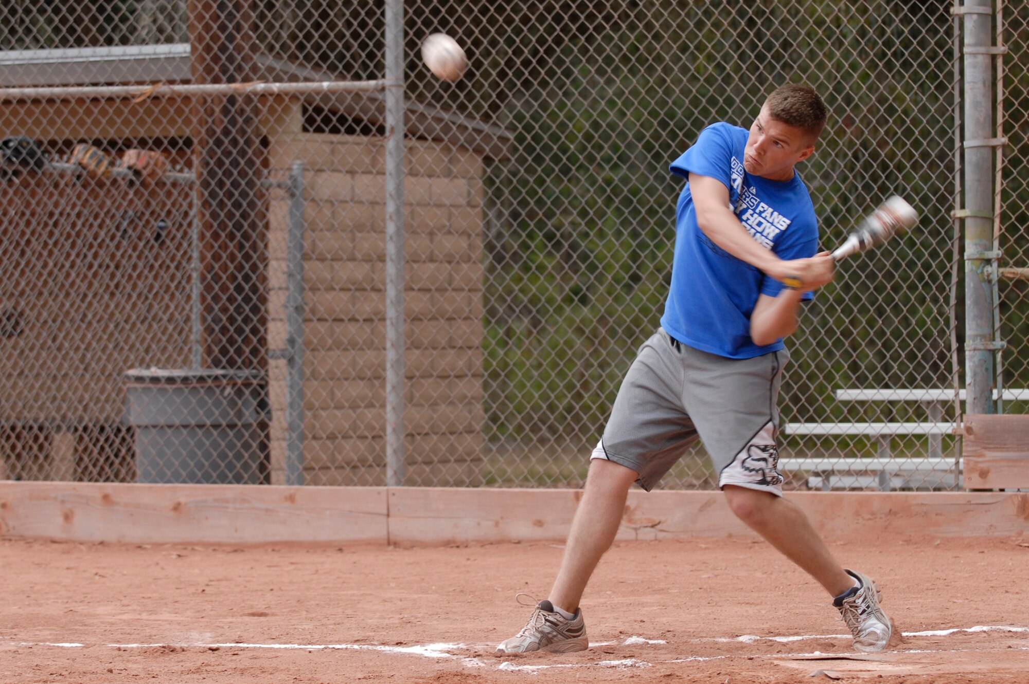 VANDENBERG AIR FORCE BASE, Calif. -- Jay Steinbacher, a 381st Training Group team member, swings at a softball during the intramural softball game at the baseball field here, Tuesday, June 28, 2011.  The 381st TRG defeated the 30th SFS team 21-9.  (U.S. Air Force photo/Staff Sgt. Andrew Satran) 

 