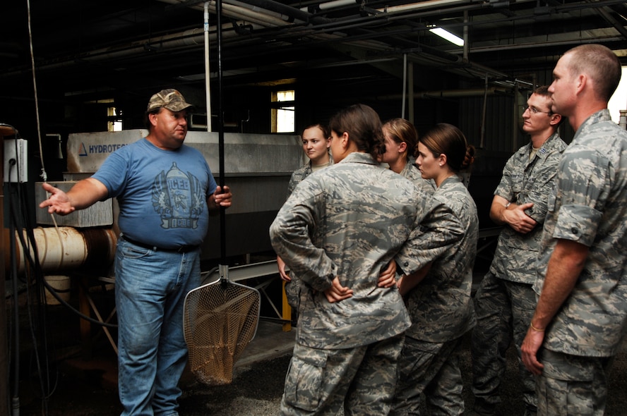 Mike Royals, operator of a local tilapia farm, explains to cadets from the U.S. Air Force Academy how the fish are raised in Valdosta, Ga., and sold internationally, June 20, 2011. During the first day of their nearly three-week visit to Moody Air Force Base Ga., the cadets interacted with many community members including a local hospital and college to get a taste of local life. (U.S. Air Force photo by Airman 1st Class Brigitte N. Brantley/Released)