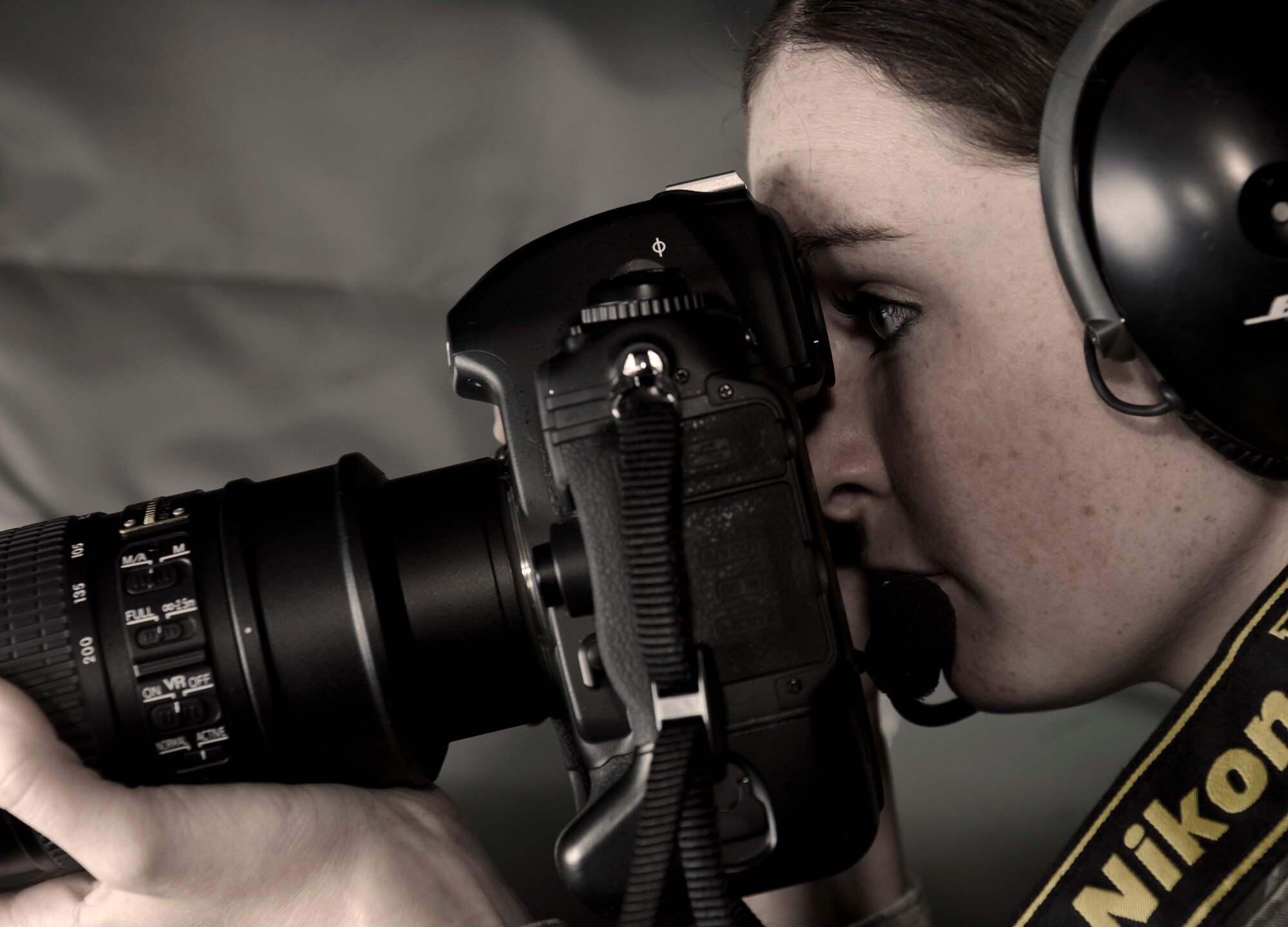 Airman 1st Class Katrina Brisbin, 22nd Air Refueling Wing still photography apprentice, performs in-flight photography aboard a McConnell KC-135 Stratotanker June 24, 2011.  Airman Brisbin’s job includes preparing photographic assignments and coordinating with customers to provide combat, investigative and informative  imagery.  (U.S. Air Force photo/Staff Sgt. Michael Schocker)

