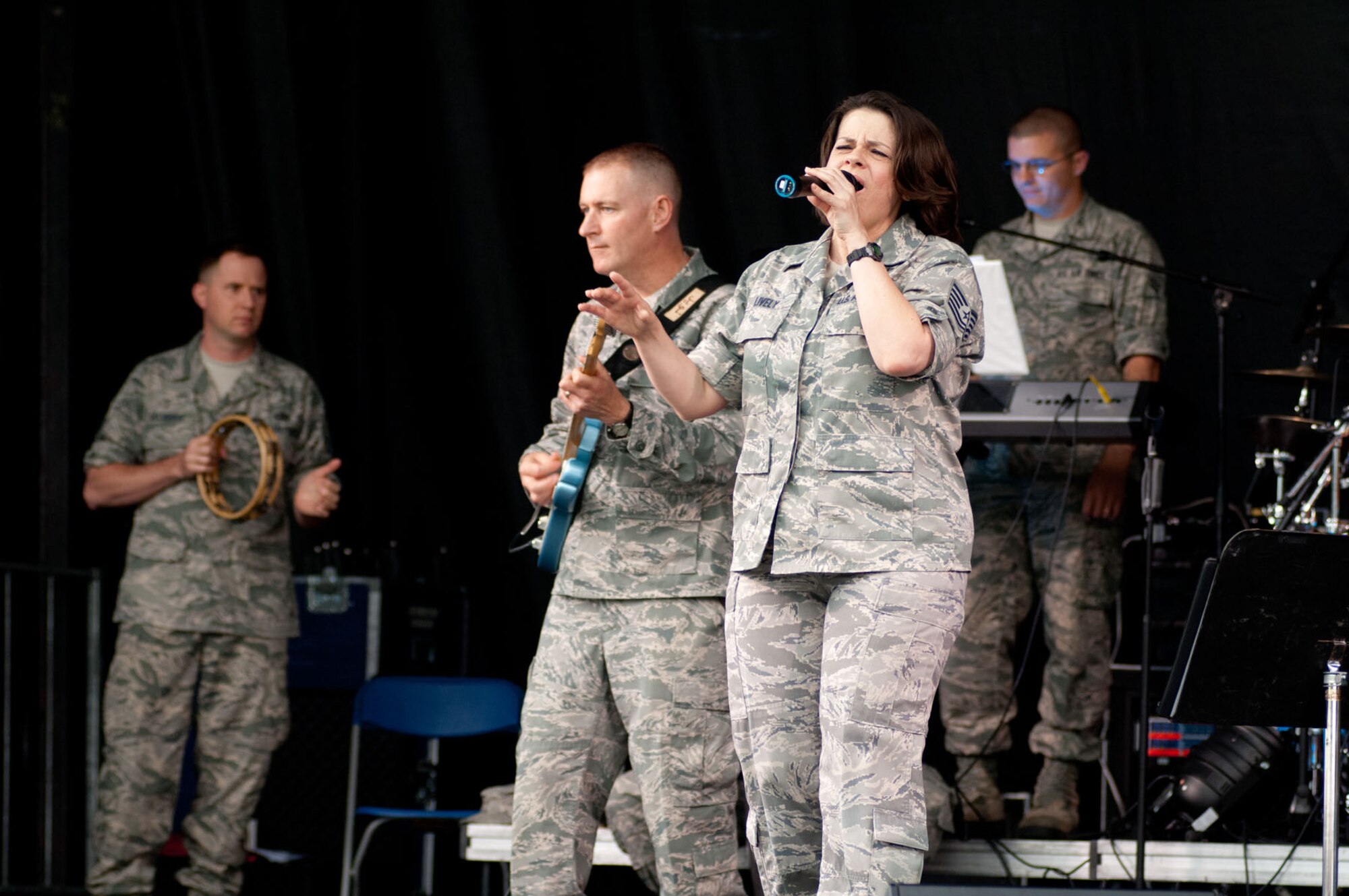 HANSCOM AIR FORCE BASE, Mass. – The U.S. Air Force Band of Liberty’s rock group, Afterburner, plays lively music to attendees at Summer Bash. (U.S. Air Force photo by Rick Berry)